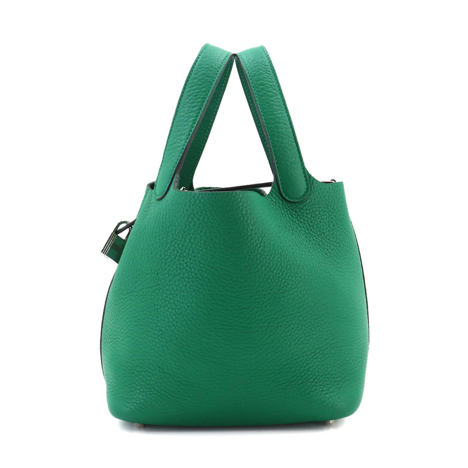 Handbag Leather: Handbag Leather This French-made leather handbag is crafted from high-quality leather, featuring a striking green color. Measuring 18.5cm x 18.5cm x 13.5cm, it offers a compact and stylish design. The