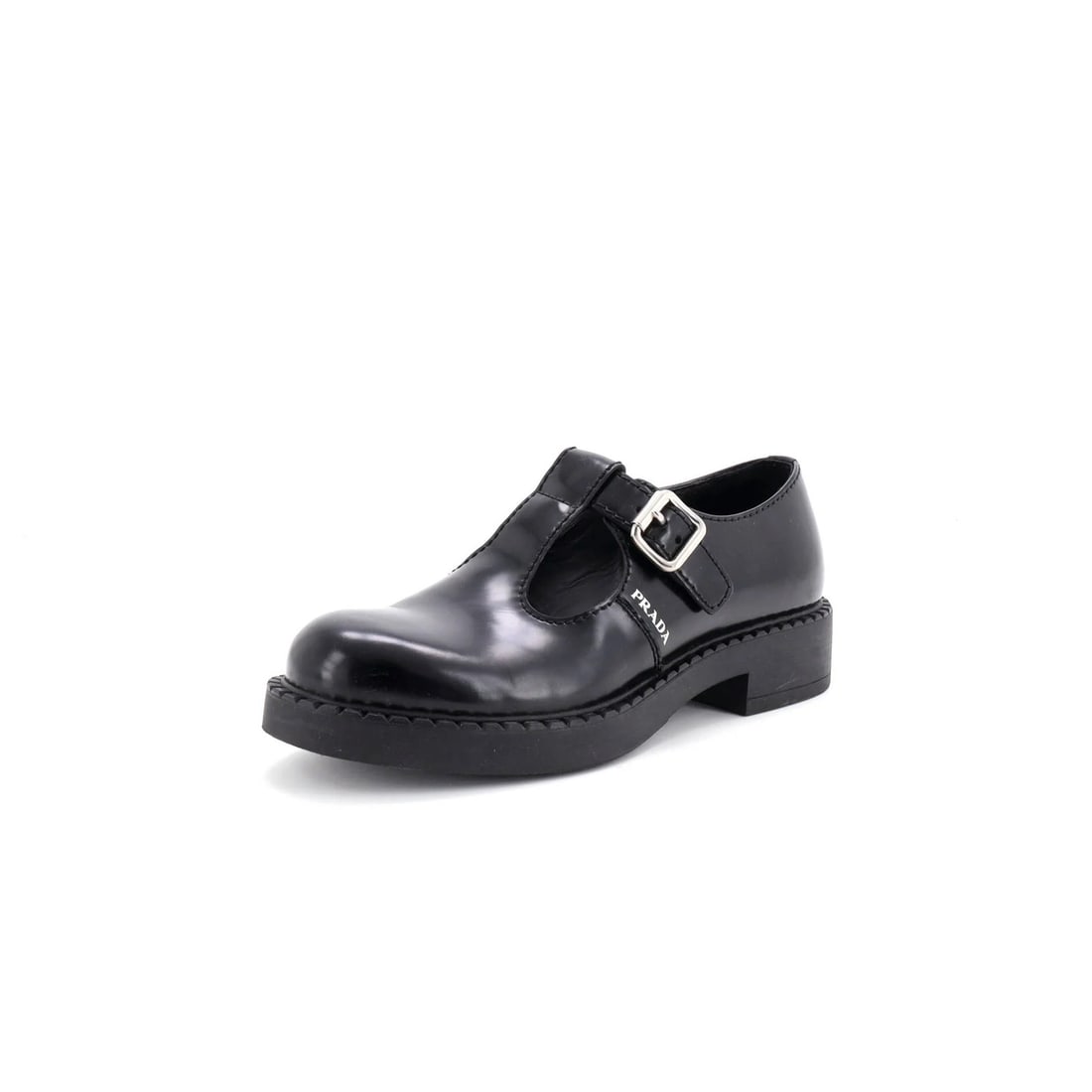 Prada Men's Mary Jane Loafers Leather: Prada Men's Mary Jane Loafers Leather Black leather Prada men's Mary Jane loafers with silver hardware, featuring a neutral interior and moderate wear throughout. The shoes showcase a classic design