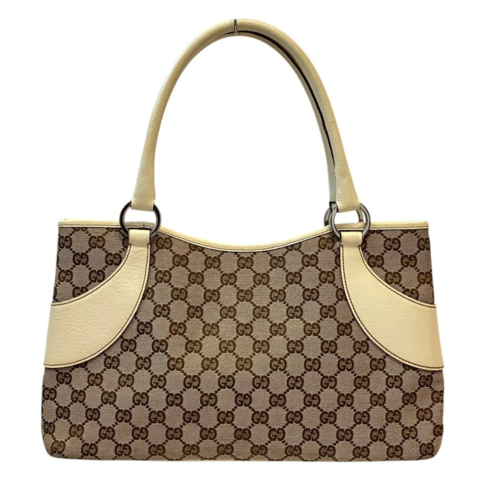 Canvas Gg Bag Tote Gucci: Canvas Gg Bag Tote Gucci Gucci's iconic GG canvas tote bag is a stylish and practical accessory, featuring the brand's signature pattern in a neutral beige color. This 20cm x 37cm x 6cm tote measures