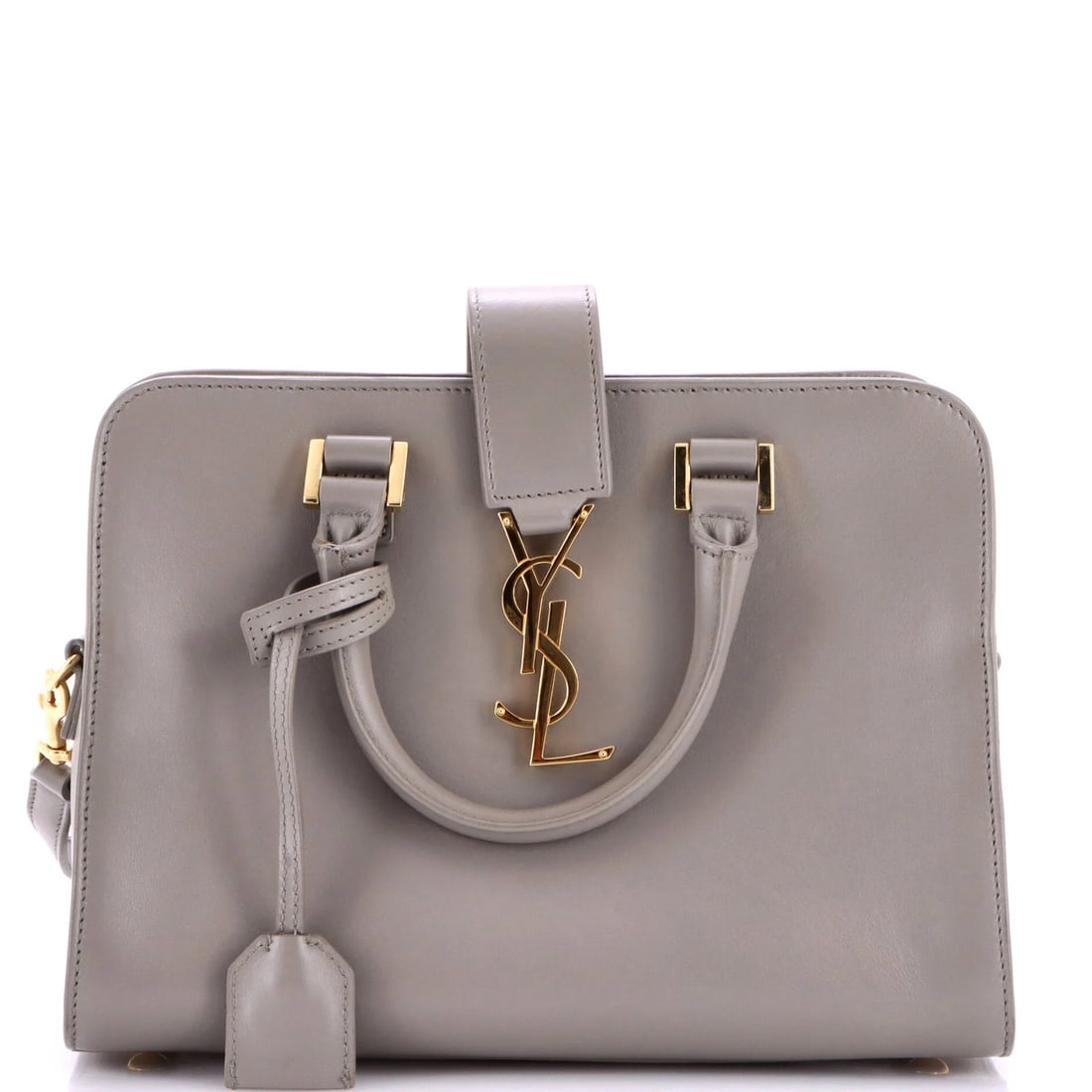 Cabas Leather Monogram Baby Saint: Cabas Leather Monogram Baby Saint This Saint Laurent Cabas Leather Monogram Baby Satchel boasts a sleek, gray exterior with a touch of sophistication. The bag's classic design is complemented by a