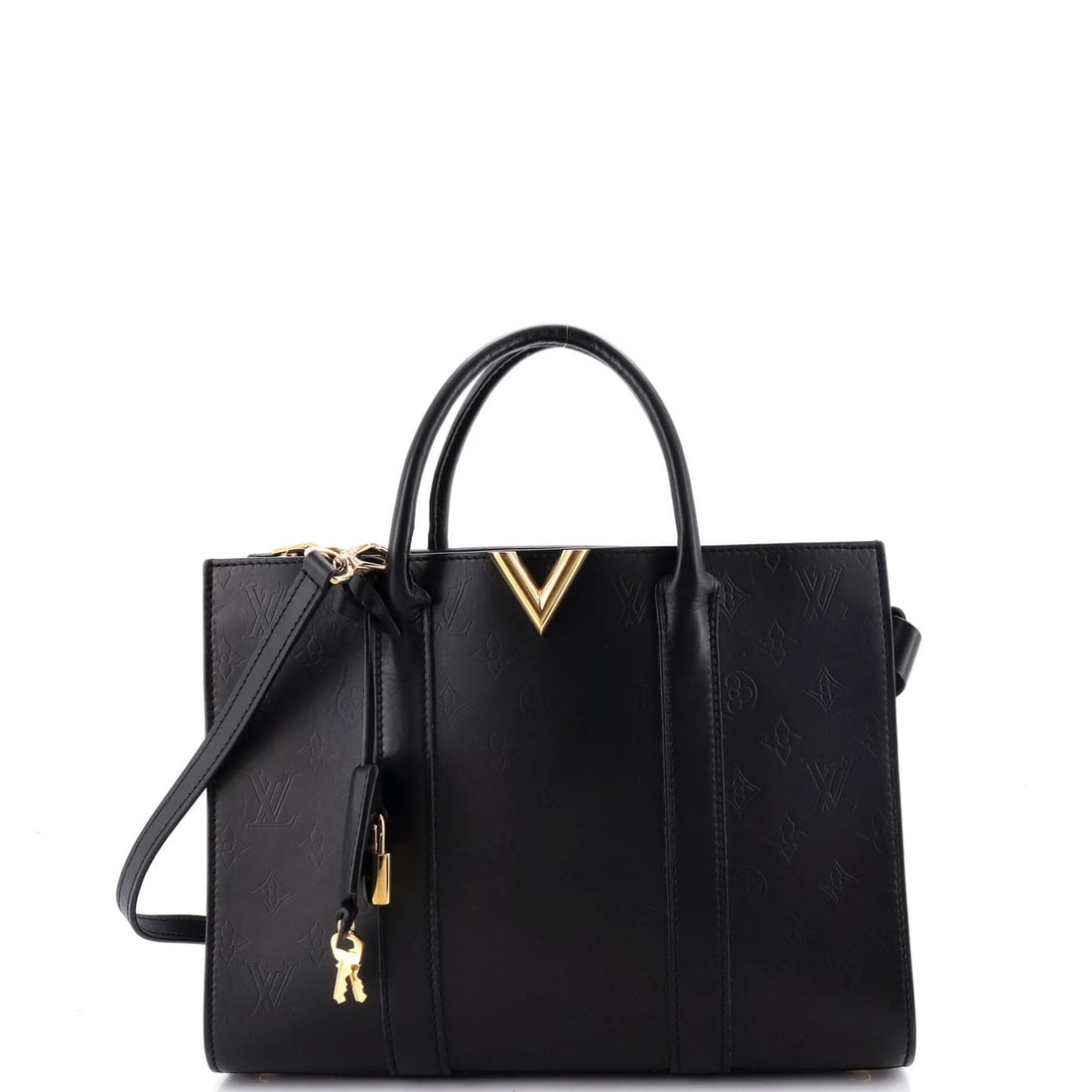 Tote Monogram Leather MM Louis Vuitton: Tote Monogram Leather MM Louis Vuitton Black Tote with Monogram Leather MM, featuring a classic design with a gold hardware and microfiber interior. The exterior shows signs of wear, including