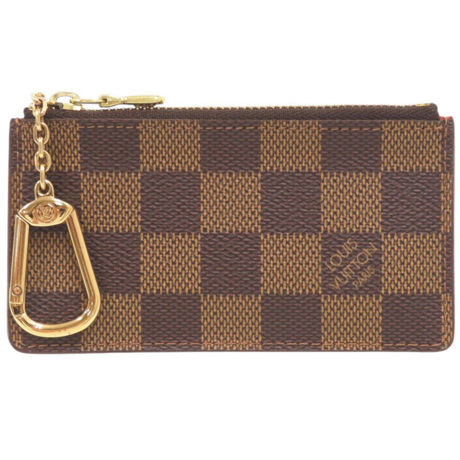 Damier Canvas Louis Vuitton Coin Purse: Damier Canvas Louis Vuitton Coin Purse Damier Canvas Louis Vuitton Coin Purse in Brown features a classic design with a signature Damier pattern, crafted from high-quality Damier Canvas material.