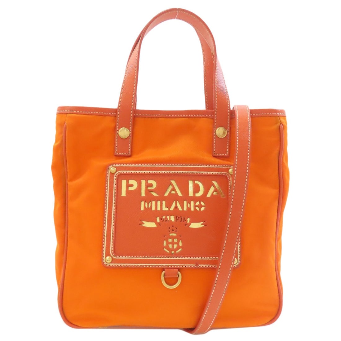Nylon Handbag Prada 2Way: Nylon Handbag Prada 2Way Orange Nylon Prada 2Way Handbag. Made from durable nylon, this vibrant orange handbag features a 2Way design. The exterior material is nylon, with the bag's color matching