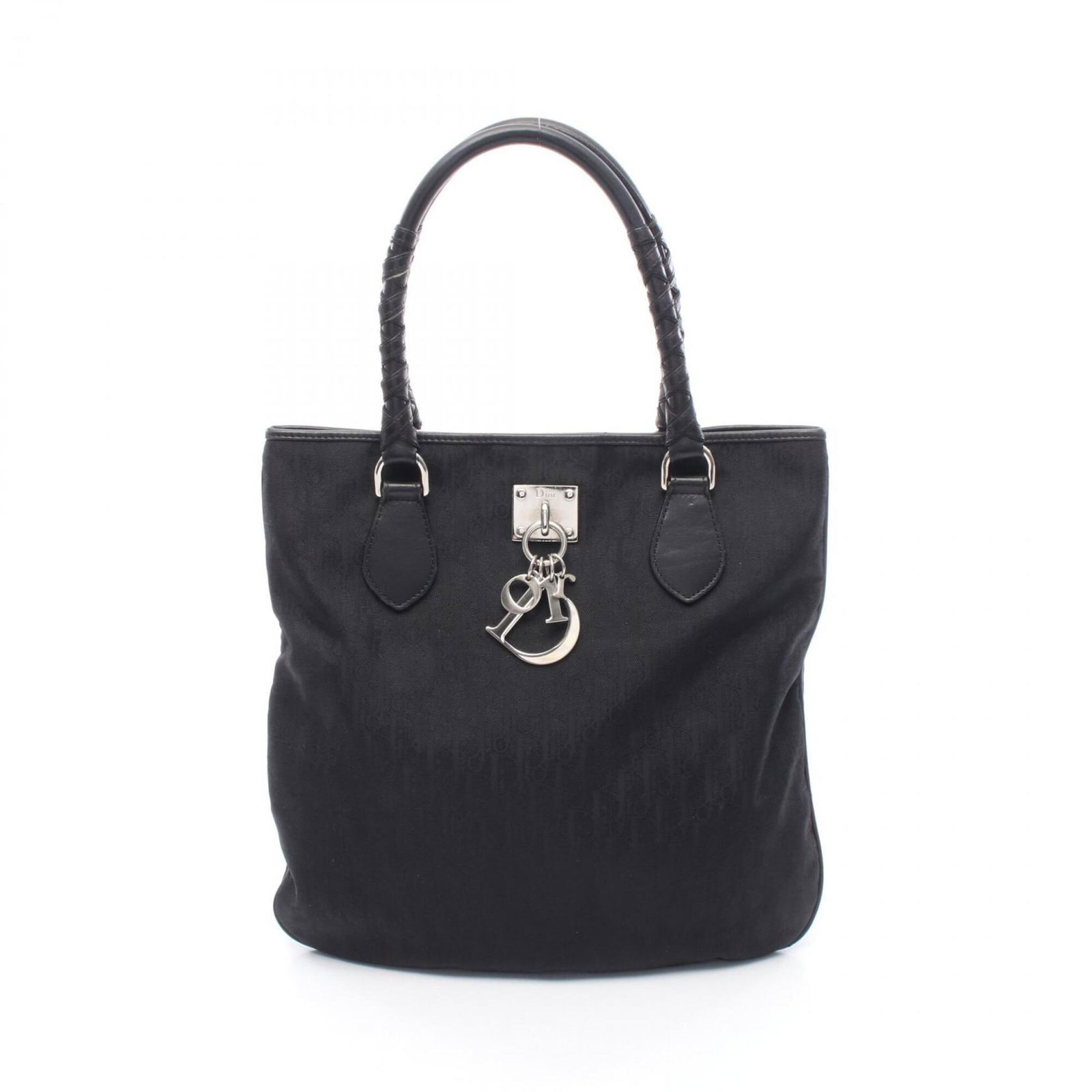 Handbag nylon tote leather bag Christian Dior: Handbag nylon tote leather bag Christian Dior Christian Dior's iconic handbag tote boasts a sleek black leather exterior, complemented by a durable nylon interior, making it a versatile and practical
