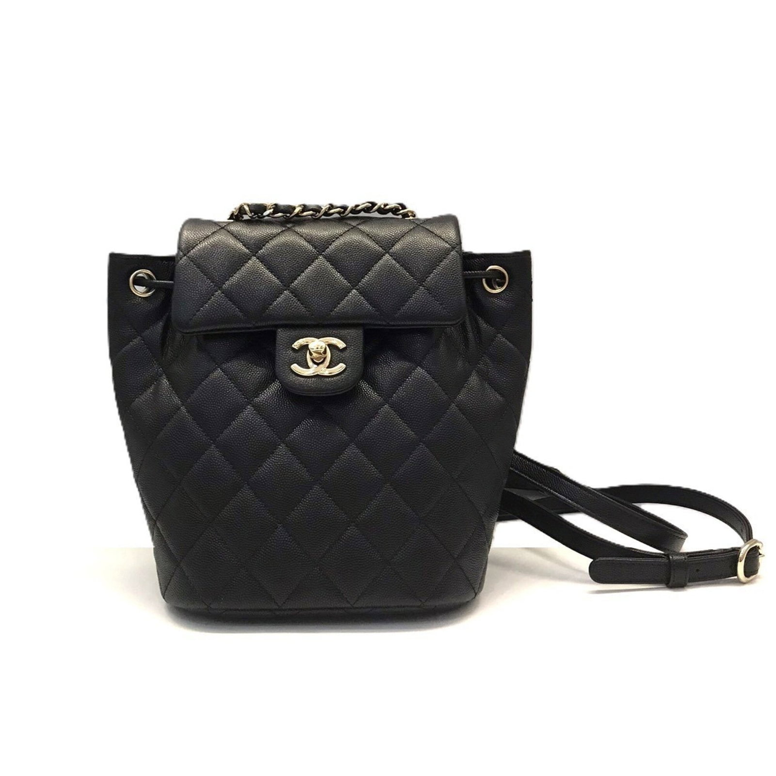 Calfskin Grained Chanel Backpack: Calfskin Grained Chanel Backpack Calfskin Grained Chanel Backpack in Black. This sleek backpack boasts a classic design with a signature grained calfskin finish, measuring 22cm x 18cm x 10cm. Its time