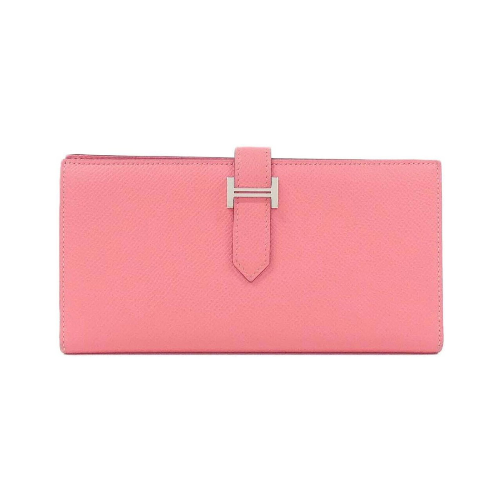 Epsom Leather Bi fold Wallet Hermes: Epsom Leather Bi fold Wallet Hermes Epsom leather, a rich and vibrant material, gives this bi-fold wallet a sophisticated touch. Measuring 9cm x 17.5cm x 2cm, it features a striking pink hue that