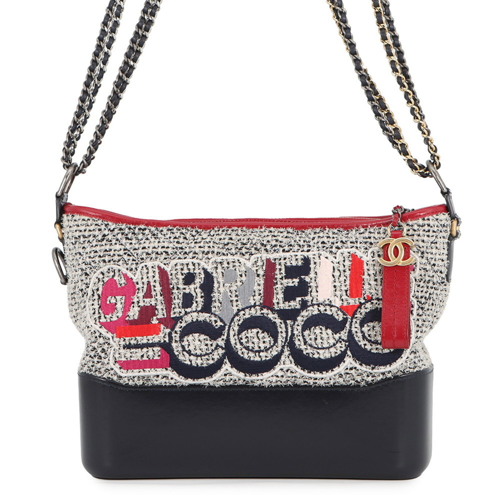 Shoulder Bag Tweed Leather Chanel: Shoulder Bag Tweed Leather Chanel Tweed leather Chanel shoulder bag with a classic navy, red, and white color palette. Measuring 22cm x 28cm x 9.5cm, this stylish bag is made from a unique blend of