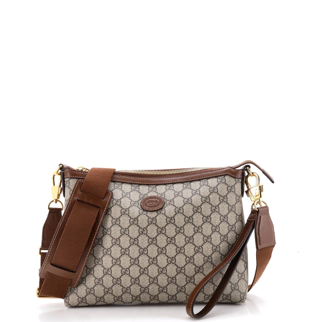 Gucci Interlocking G Patch Wristlet Medium Bag GG Coated Canvas: Gucci Interlocking G Patch Wristlet Medium Bag GG Coated Canvas The Gucci Interlocking G Patch Wristlet Medium Bag boasts a stylish medium size, with a canvas coated exterior in rich brown and a gold-