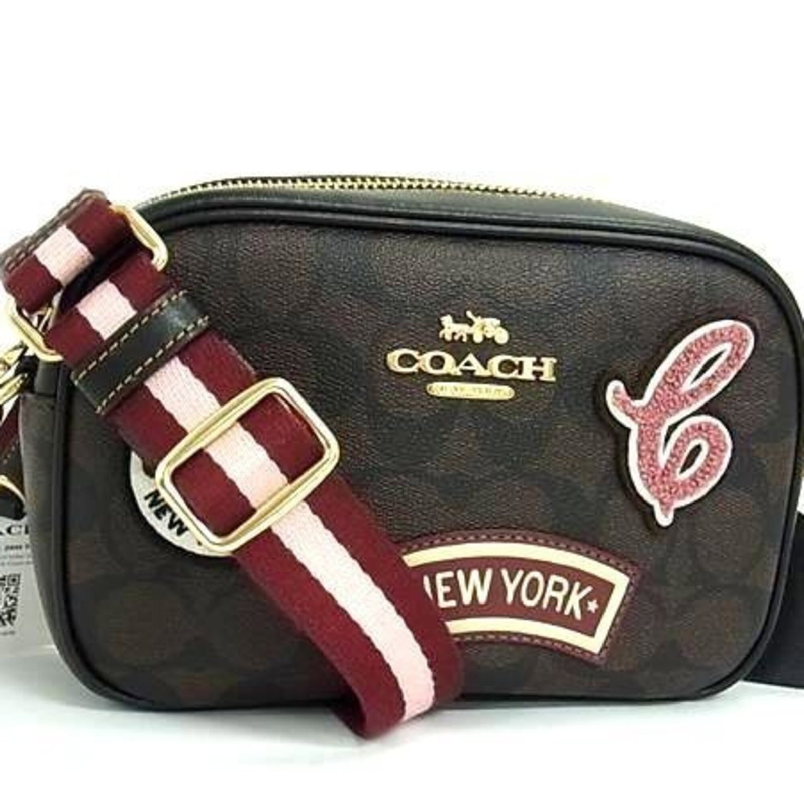 Pochette Leather Pvc Coach Bag Shoulder: Pochette Leather Pvc Coach Bag Shoulder PVC and leather combine in this sleek Coach Country pochette shoulder bag, available in black and brown. Measuring 12cm x 18.5cm x 6cm, it features a striking
