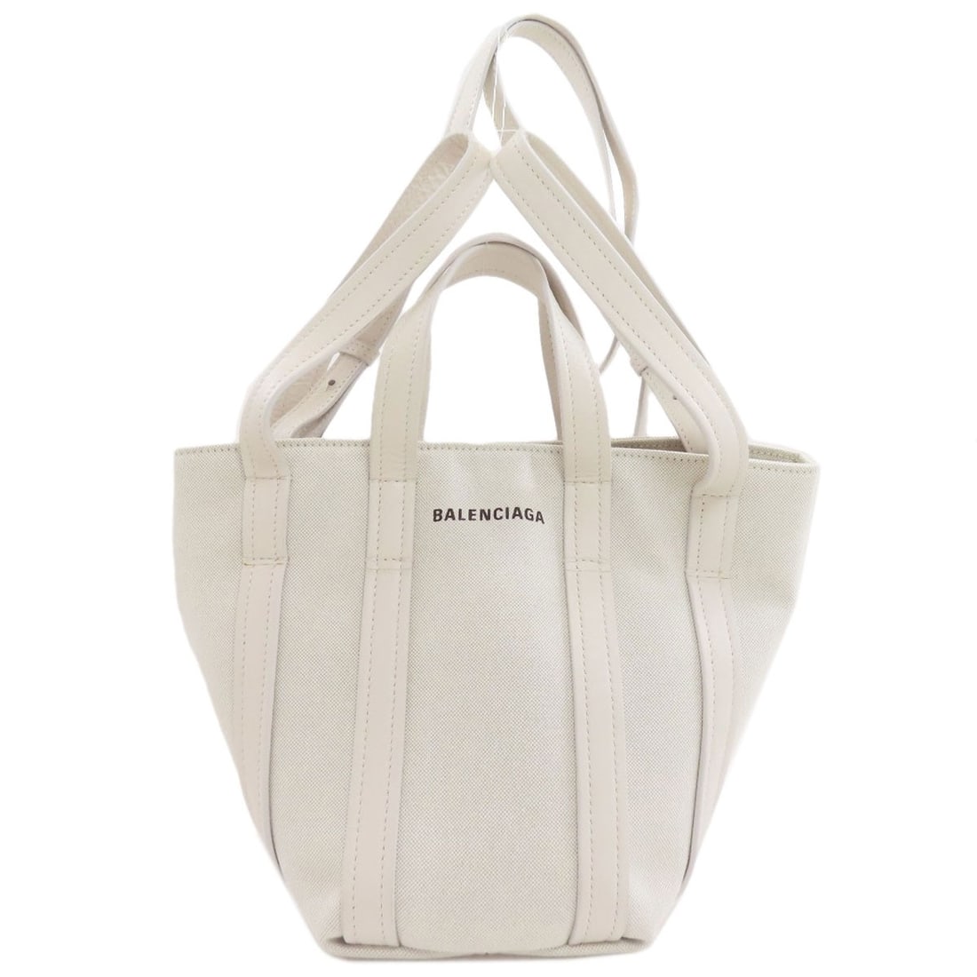 Balenciaga 672793 Everyday 2Way Handbag Canvas: Balenciaga 672793 Everyday 2Way Handbag Canvas White canvas Balenciaga 672793 Everyday 2Way handbag with a signature. This canvas handbag features a 2Way design, making it a versatile and stylish