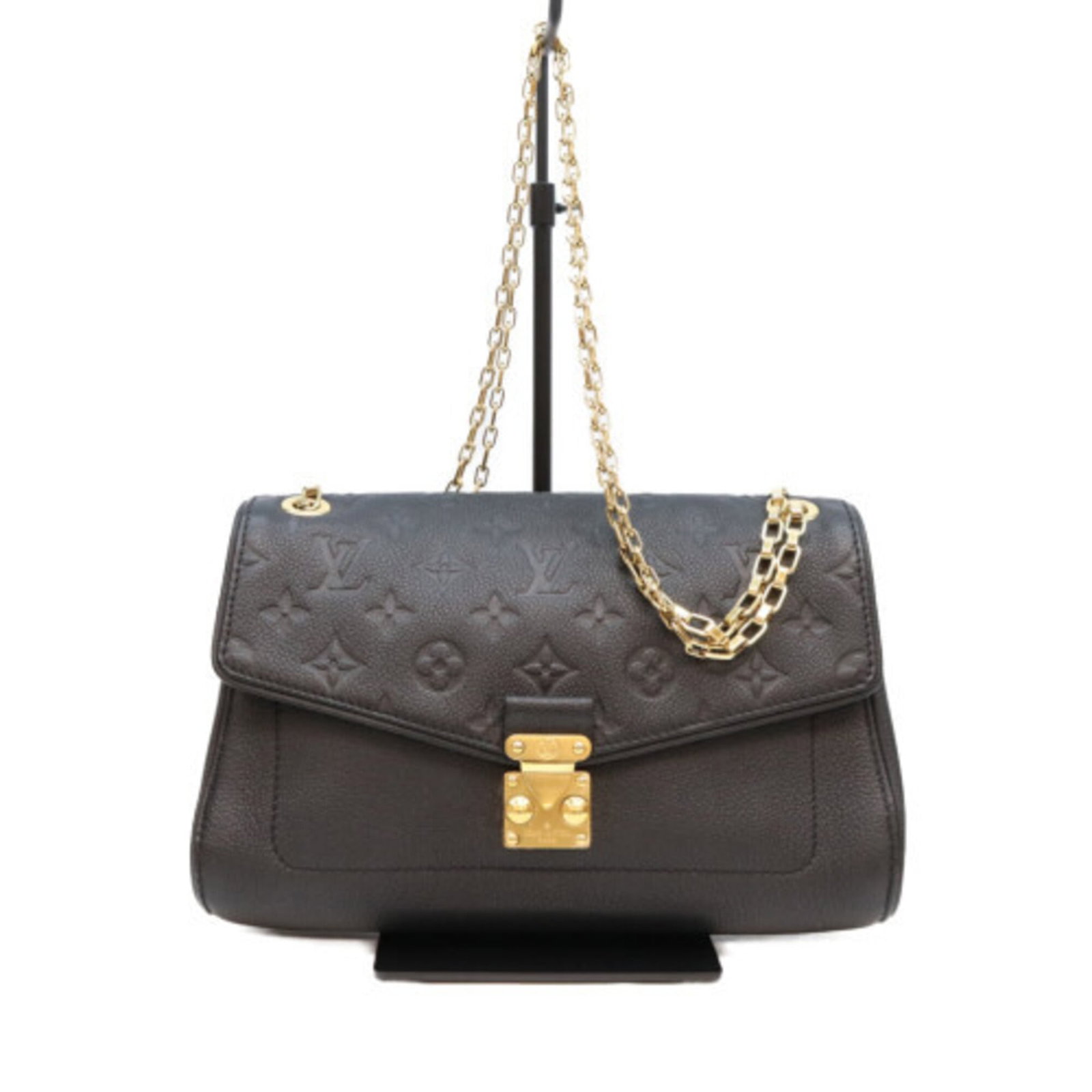 Shoulder Bag Monogram Empreinte Louis Vuitton: Shoulder Bag Monogram Empreinte Louis Vuitton Monogram Empreinte Louis Vuitton shoulder bag in sleek black, adorned with gold hardware, features a timeless design that exudes luxury. The bag's