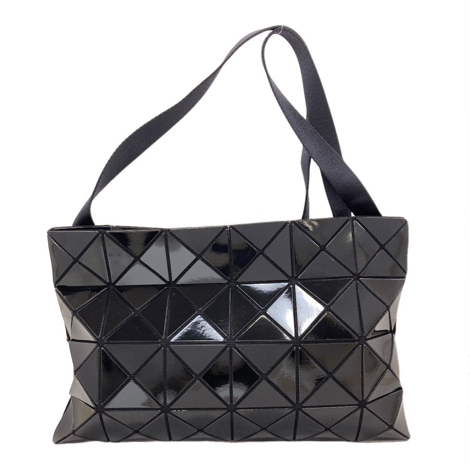 Shoulder Bag Pvc Issey Miyake: Shoulder Bag Pvc Issey Miyake This Issey Miyake shoulder bag is crafted from durable PVC, featuring a sleek black design. Measuring 22.5cm x 34cm x 5.00mm, it boasts a compact size with a sturdy