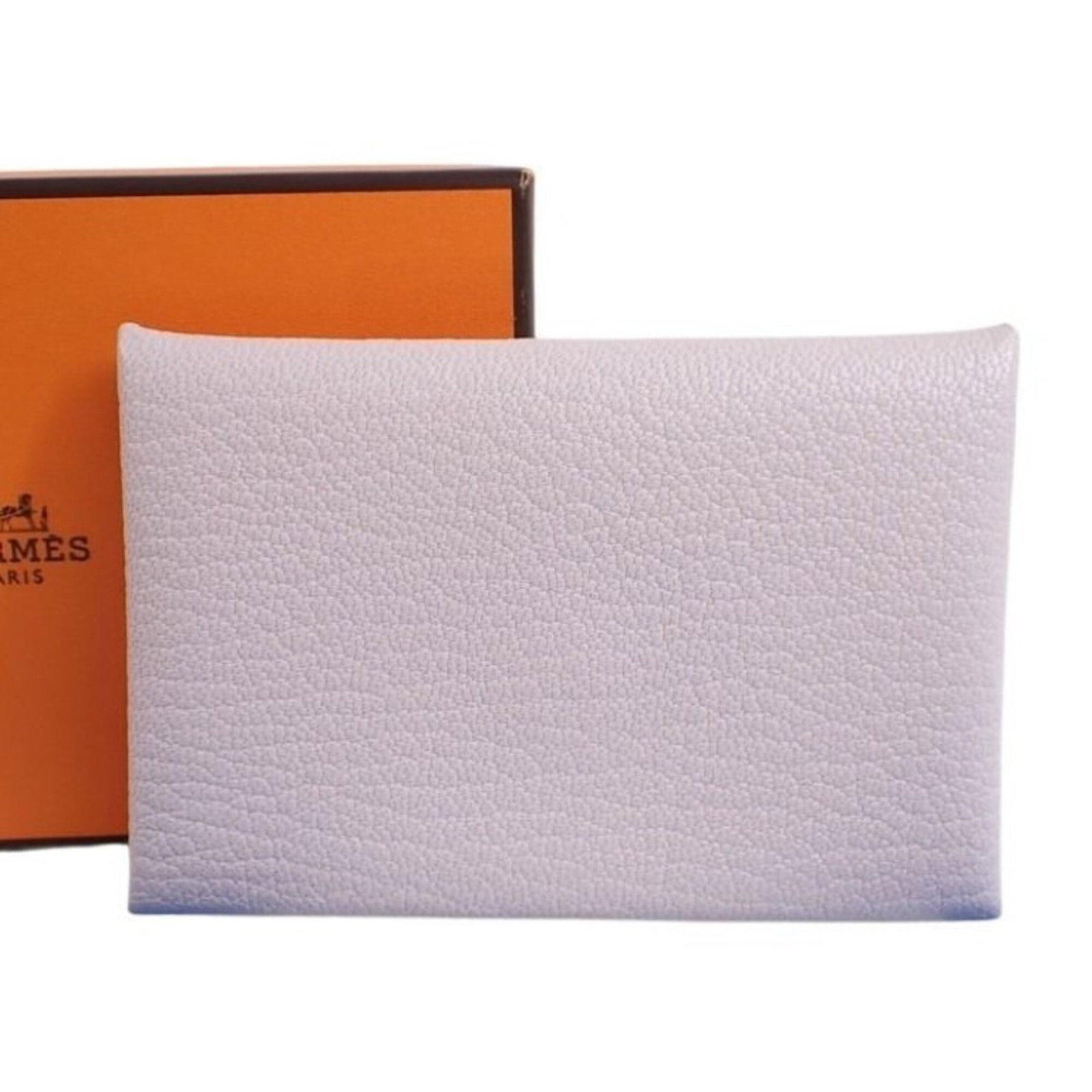 Chevre leather card case by Hermes: Chevre leather card case by Hermes Chevre leather card case by Hermes features a soft pink hue and a sleek, compact design. Made from high-quality chevre leather, this card case measures 7cm x 10.5cm 