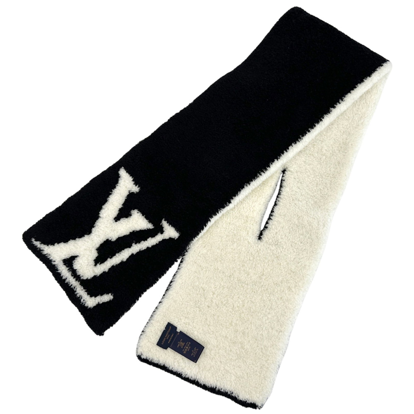 Vuitton Shawl Wool Nylon Urethane Louis: Vuitton Shawl Wool Nylon Urethane Louis Black and White Louis Vuitton Shawl made from Wool, Nylon, and Urethane, measuring 1.22m x 20cm. This unique shawl combines contrasting materials and colors,