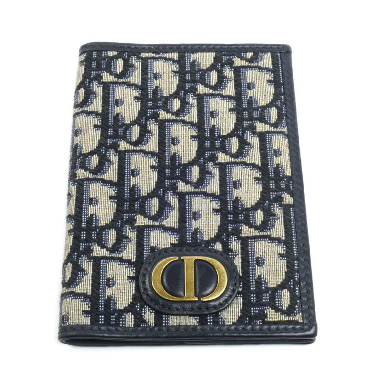 Christian Dior Jacquard Cover Passport: Christian Dior Jacquard Cover Passport Beige or Navy Jacquard Cover Passport from Christian Dior, crafted with a classic 14cm x 10cm design, features a signature from the renowned fashion house. Made 