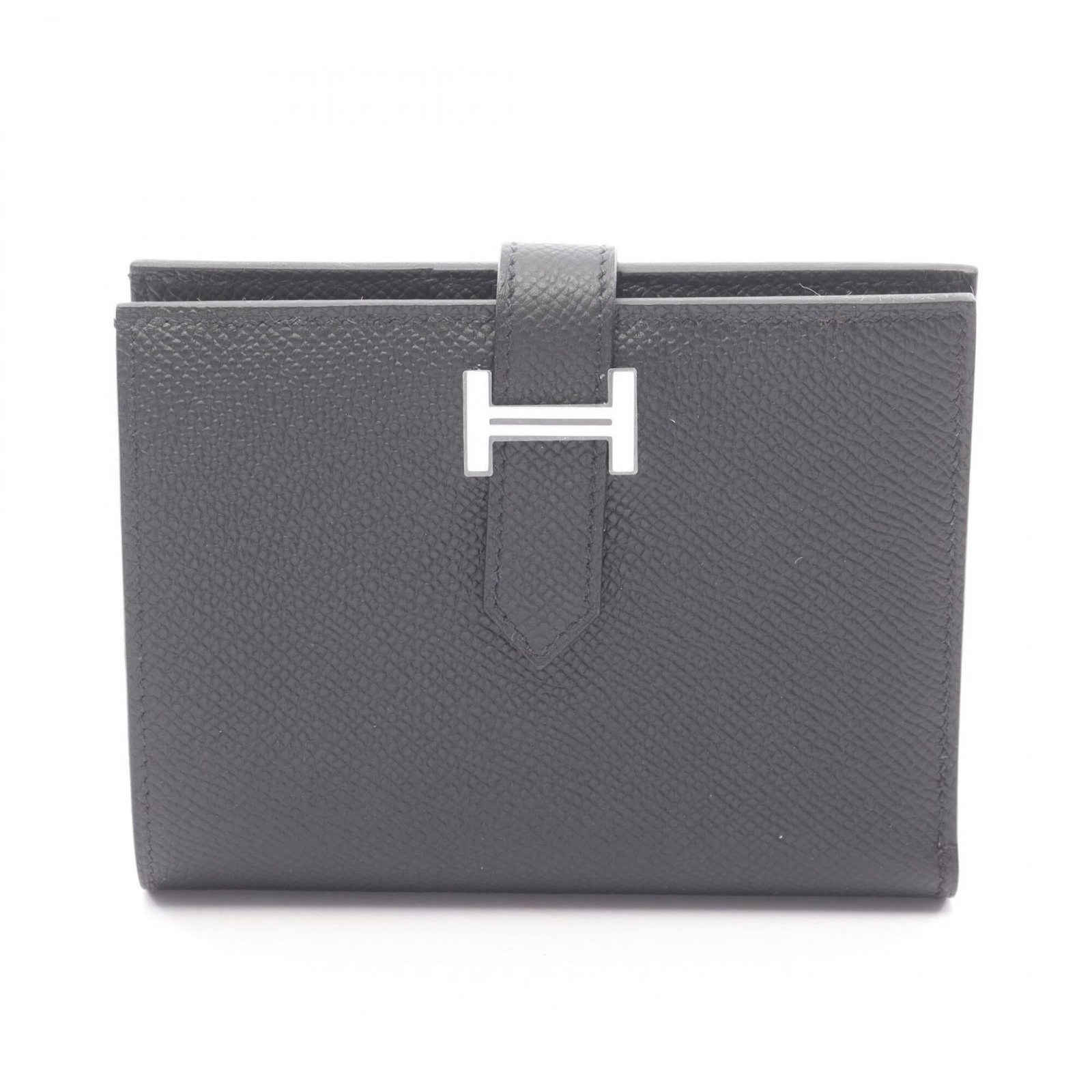 Bi fold Epsom Leather Hermes Wallet: Bi fold Epsom Leather Hermes Wallet Epsom leather gives this bi-fold wallet a rich, sophisticated look. The sleek black design and precise measurements make it a stylish accessory for everyday use.