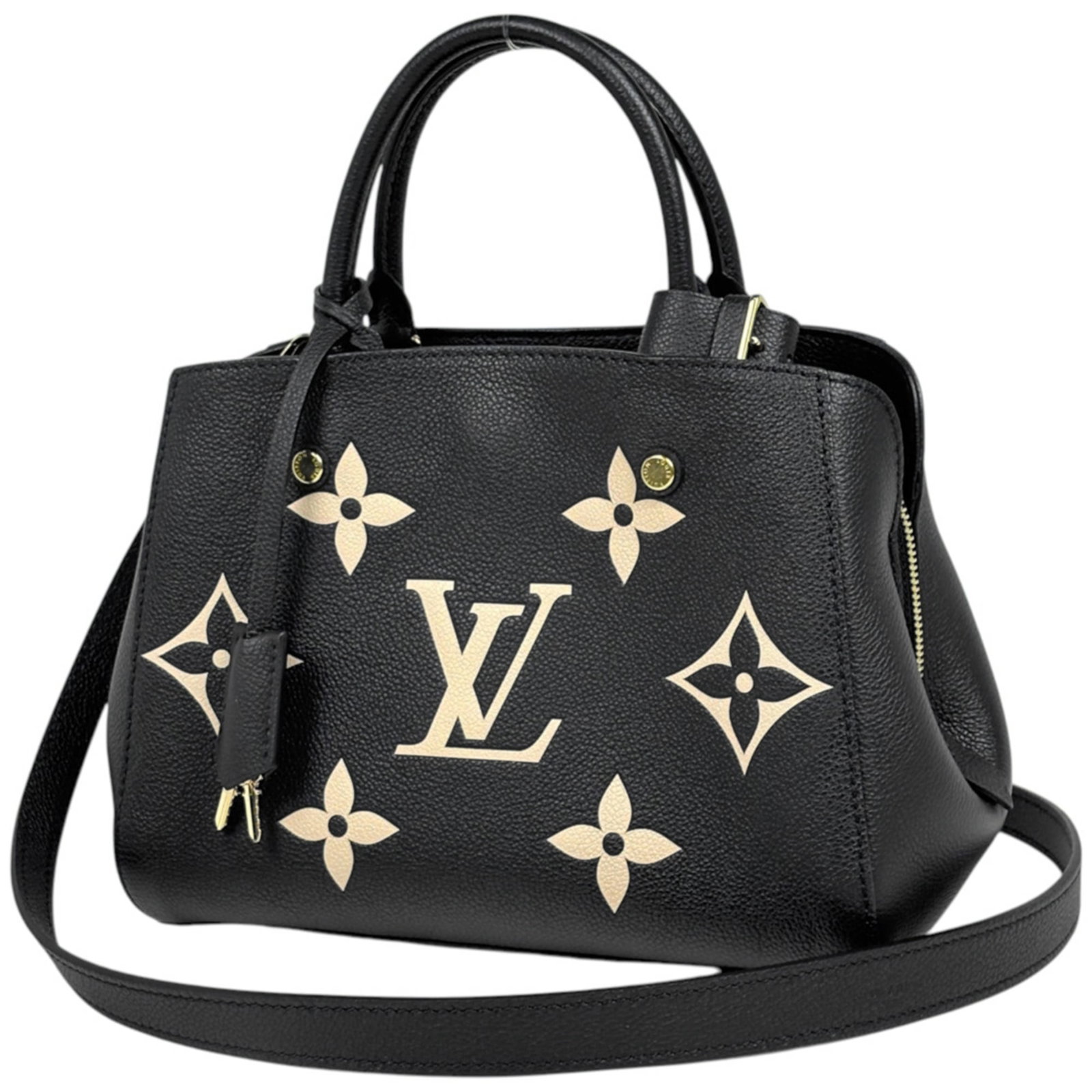 Handbag Louis Vuitton Monogram Empreinte: Handbag Louis Vuitton Monogram Empreinte The Louis Vuitton Monogram Empreinte handbag boasts a classic design with a timeless beige and black color combination. Measuring 19cm x 25cm x 11cm, this
