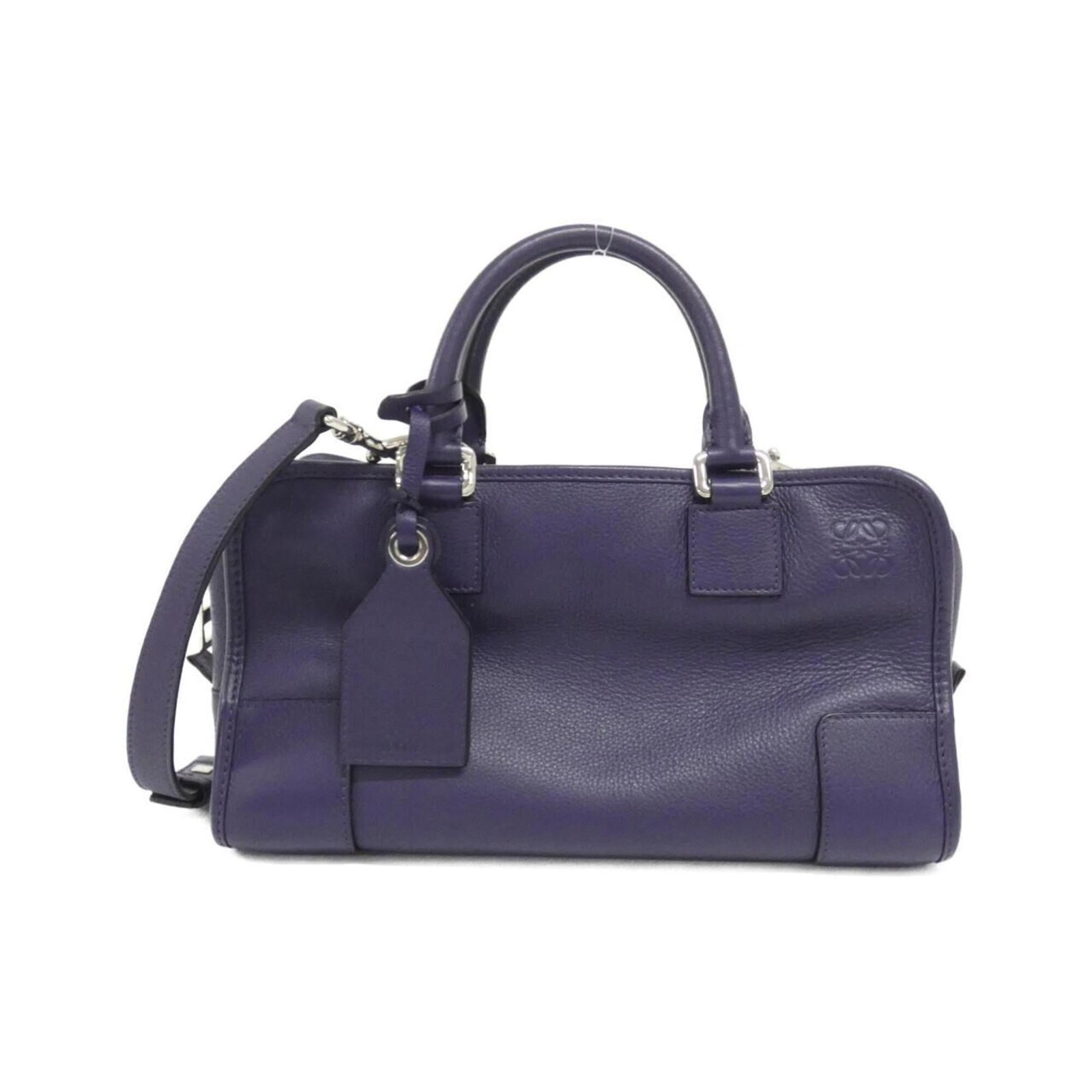 Handbag Leather Handbag: Handbag Leather Handbag Leather handbag from Loewe, featuring calfskin material and a purple color. The bag measures 17cm x 28cm x 14cm and is made with silver hardware. A signed Loewe MPN 352 12 N03 