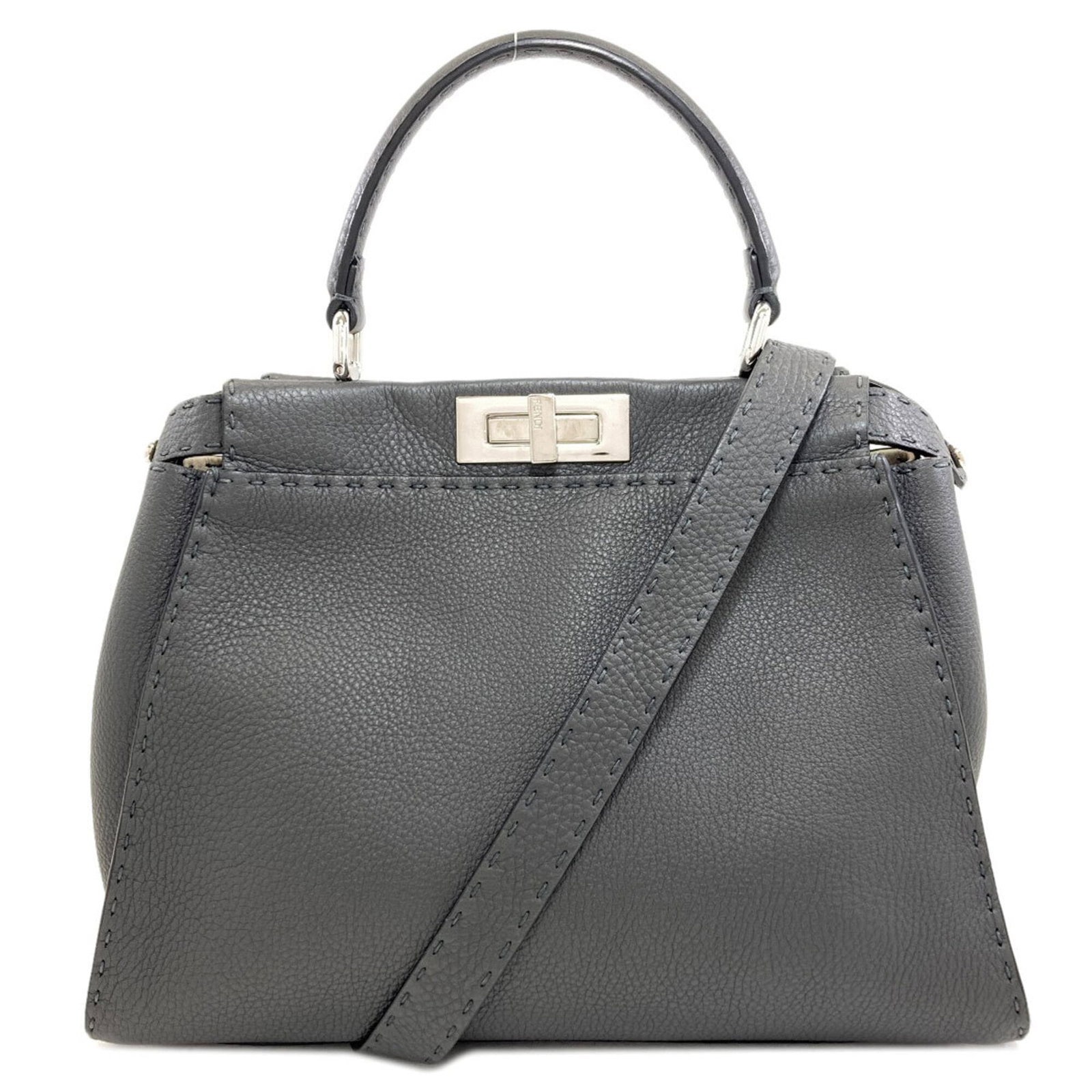 Handbag Leather Fendi: Handbag Leather Fendi Gray Fendi handbag made from high-quality calfskin leather, with a distinctive size of 25cm x 34cm x 13cm. This stylish accessory boasts a sleek and sophisticated design,