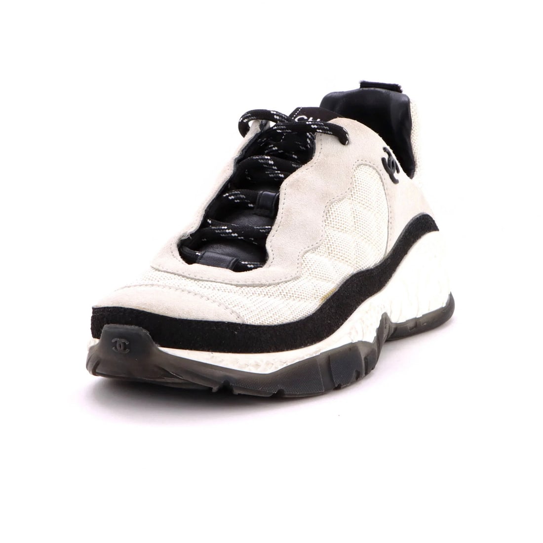 Suede Quilted Coco Women's Mesh CC Chanel Sneakers: Suede Quilted Coco Women's Mesh CC Chanel Sneakers Suede and quilted mesh exterior adds a touch of luxury to these women's Coco Neige CC sneakers, featuring a unique blend of materials and styles. The