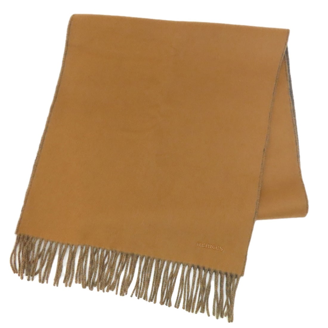 Cashmere Hermes Logo Scarf: Cashmere Hermes Logo Scarf Cashmere and the iconic Hermes logo come together in this luxurious brown scarf. Made from high-quality cashmere, this scarf exudes elegance and sophistication. The subtle H