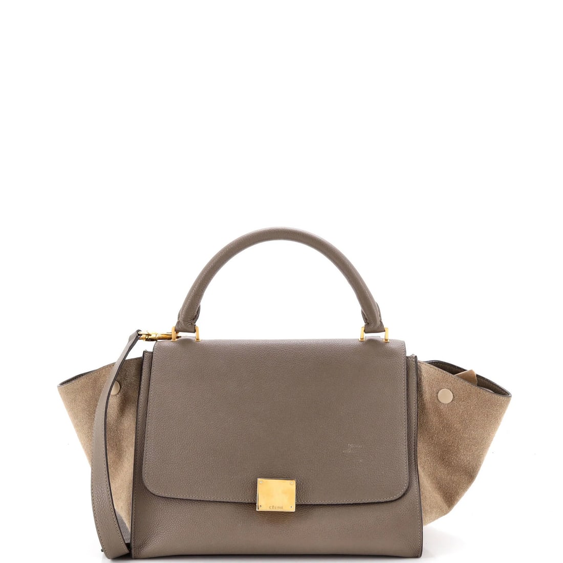 Trapeze Small Leather Celine Bag: Trapeze Small Leather Celine Bag The Celine Trapeze Small Leather Bag features a rich brown suede exterior, adorned with aged gold hardware, and a classic top handle design. With its spacious