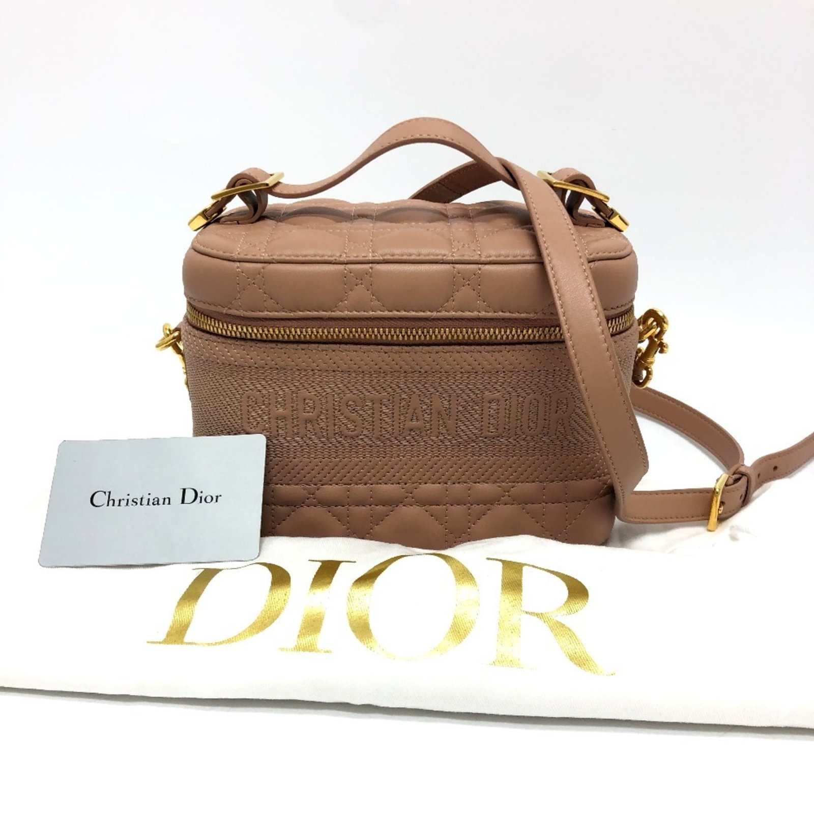 Canvas Handbag Leather Christian Dior Bag Vanity: Canvas Handbag Leather Christian Dior Bag Vanity Canvas Handbag with Leather Details, Christian Dior Cannage Stitch Logo, and 2WAY Shoulder Bag Design. This pink vanity bag features a unique combinati