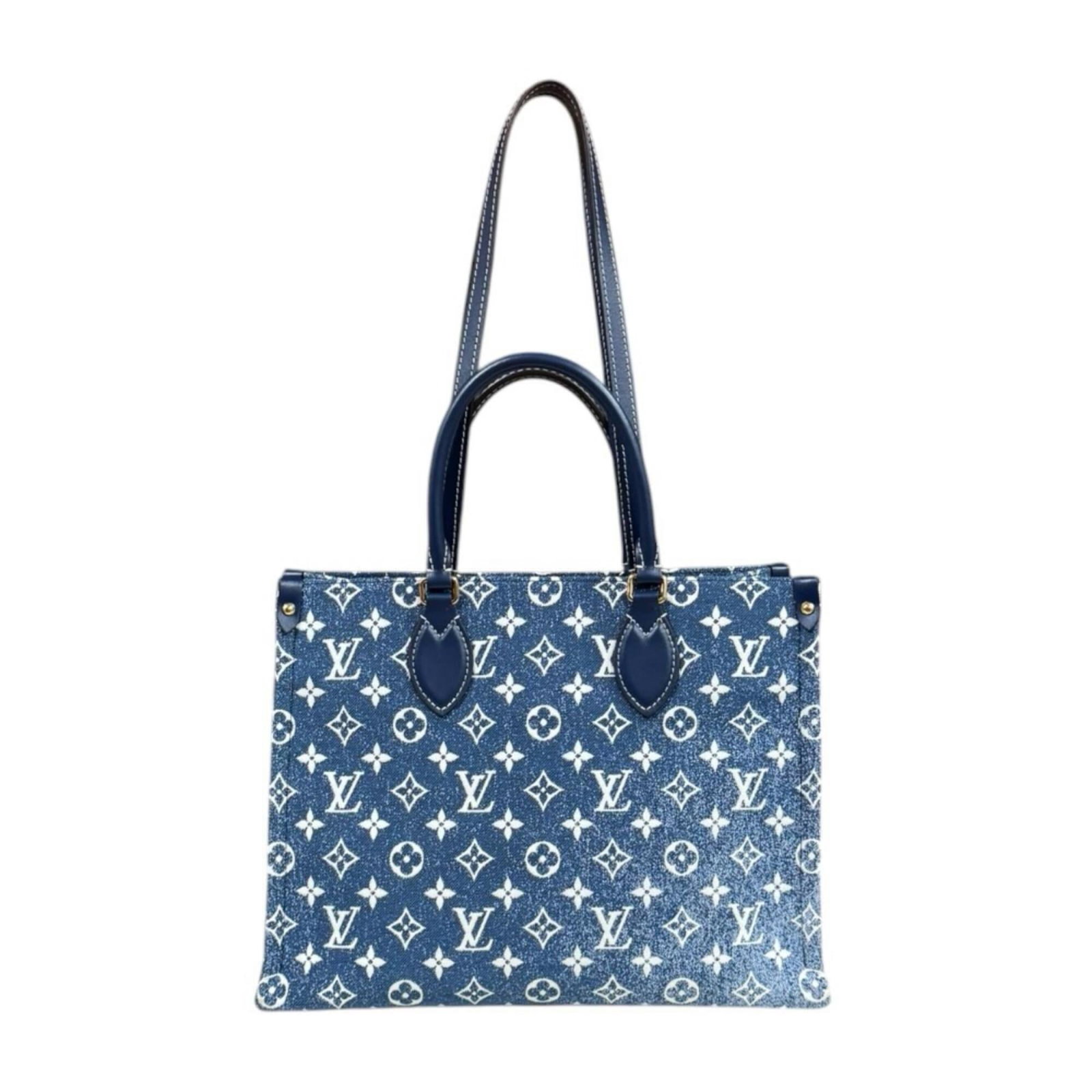 Shoulder Bag Monogram Louis Vuitton: Shoulder Bag Monogram Louis Vuitton Navy blue Monogram Louis Vuitton shoulder bag with classic design, measuring 25cm x 32.5cm x 14cm. The iconic Monogram pattern adds a touch of sophistication to thi