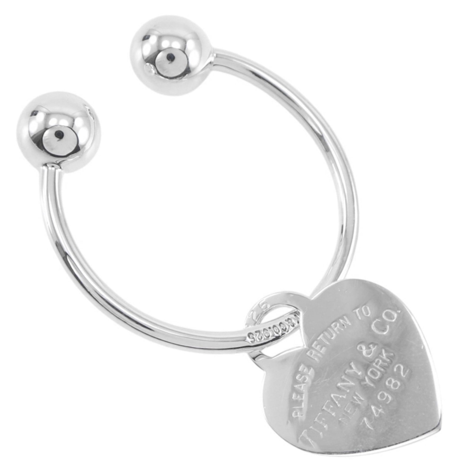 Tiffany Keyring Silver 925: Tiffany Keyring Silver 925 Silver 925 Keyring from Tiffany, crafted with attention to detail, features a sleek design and premium material. Measuring 6cm x 2.2cm, this keyring is a stylish accessory