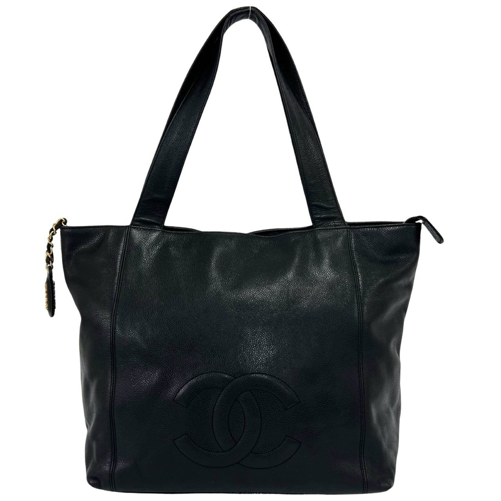 Calfskin Tote Bag Chanel: Calfskin Tote Bag Chanel Grained calfskin construction and sleek black design make this Chanel tote bag a stylish and sophisticated accessory. Measuring 30cm x 43cm x 17cm, it offers ample space for d