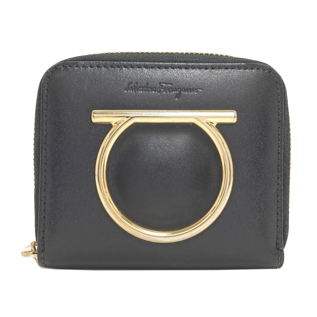 Salvatore Ferragamo Gancinihardware Coin Purse Leather: Salvatore Ferragamo Gancinihardware Coin Purse Leather The Salvatore Ferragamo Gancini hardware coin purse leather is a sleek and sophisticated accessory. Made from high-quality leather, this black