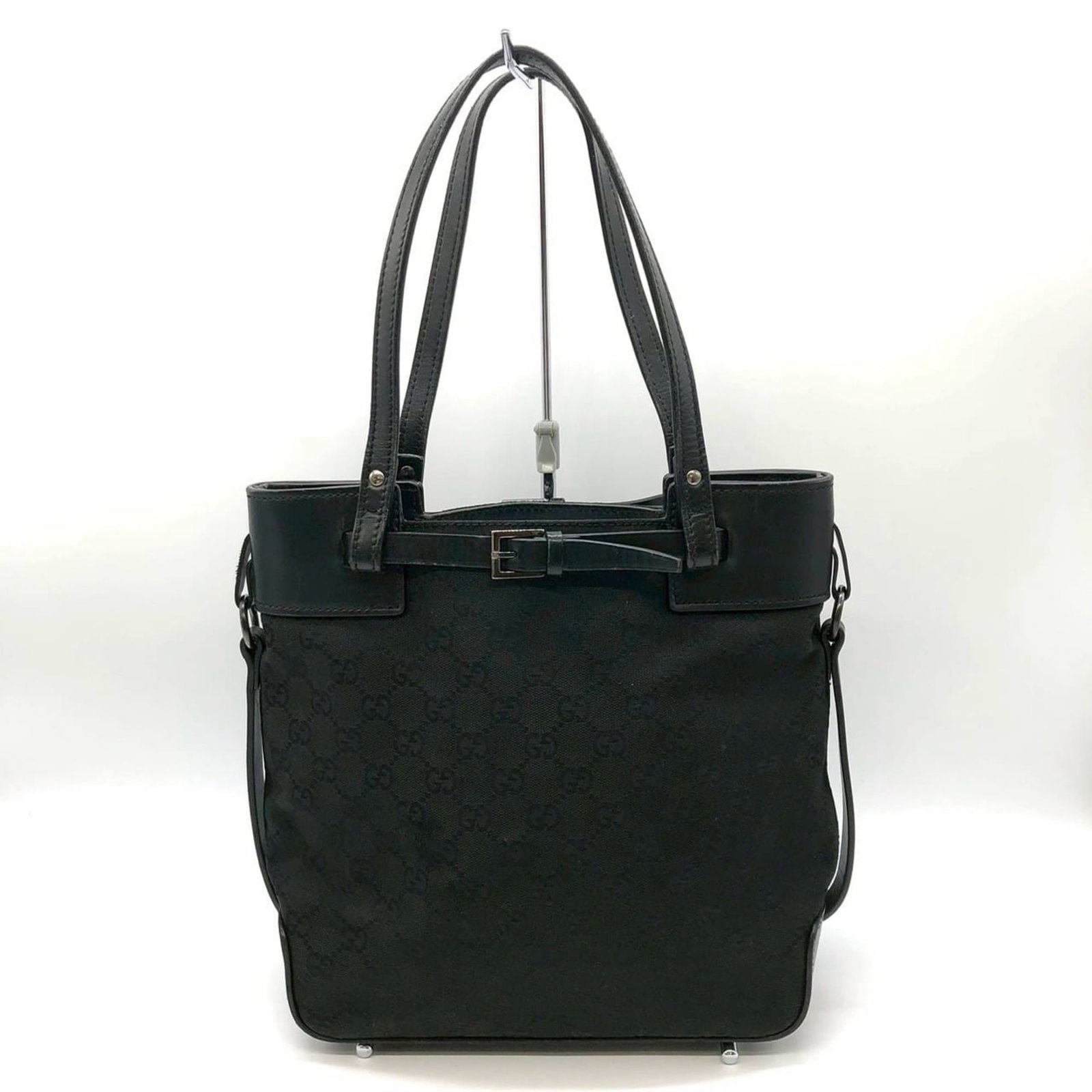 Canvas Handbag Gg Gucci Tote: Canvas Handbag Gg Gucci Tote Canvas Handbag Gg Gucci Tote - A sleek and stylish black GG canvas tote bag from the iconic Gucci brand, measuring 24cm x 24cm x 10cm. This compact tote features the