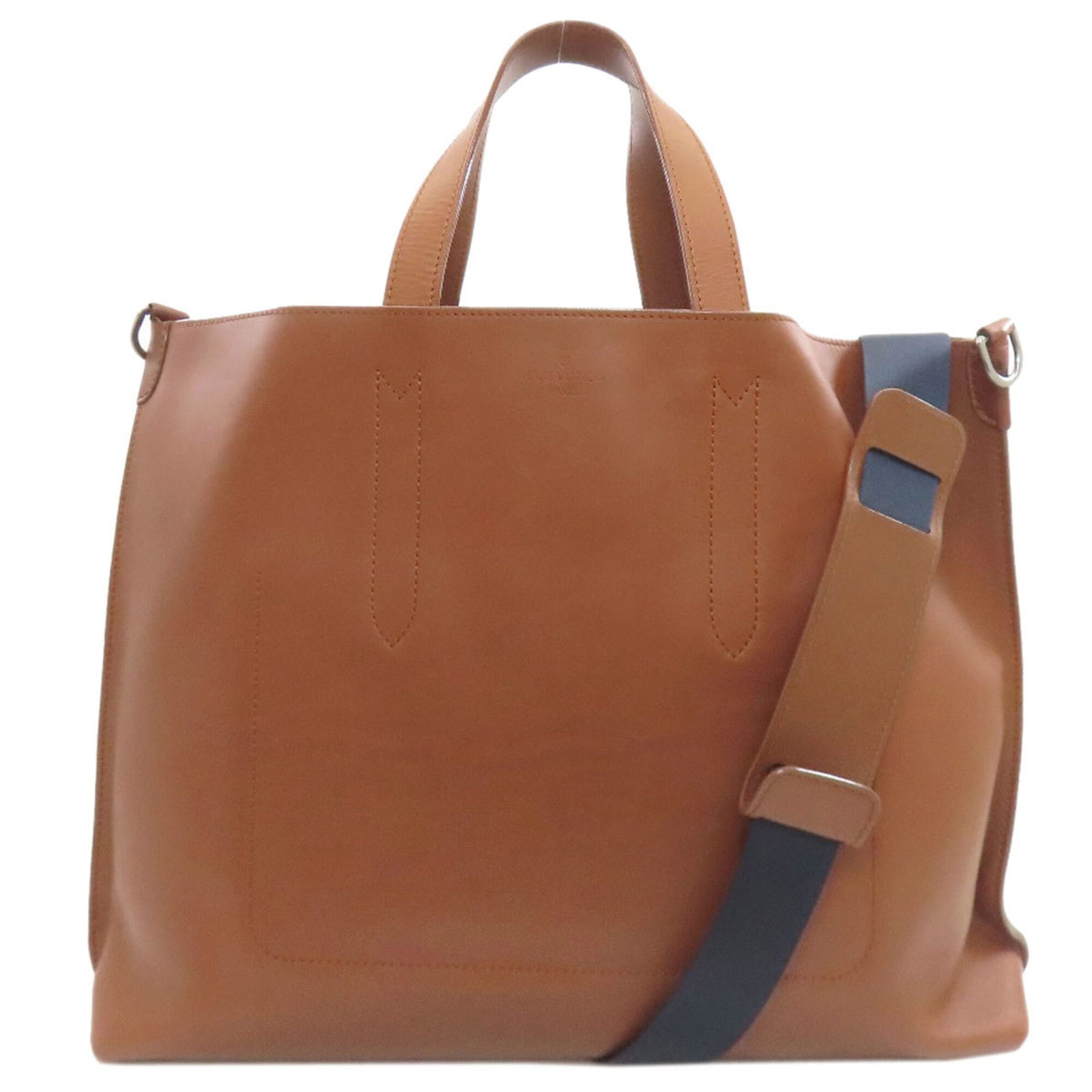 Louis Vuitton Tote Bag Leather: Louis Vuitton Tote Bag Leather Brown Louis Vuitton Tote Bag Made from high-quality Calfskin Leather, this classic tote bag boasts a timeless design with clean lines and a spacious interior. Measuring