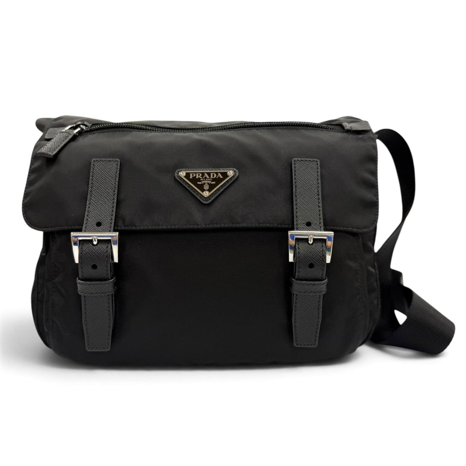 Shoulder Bag Nylon Leather Prada: Shoulder Bag Nylon Leather Prada Nylon and leather combine in this sleek Prada shoulder bag, measuring 20cm x 26cm x 11cm. The black color and durable materials make it a practical choice. Its