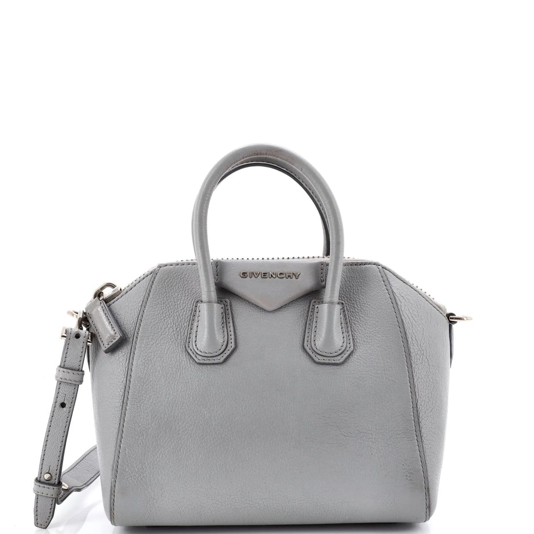Leather Mini Bag Antigona Givenchy: Leather Mini Bag Antigona Givenchy Gray leather mini bag with gold tone hardware, featuring a classic cross body design. The Antigona bag measures 7.5" tall, 8.5" wide, and 5" deep, with a 3" drop han