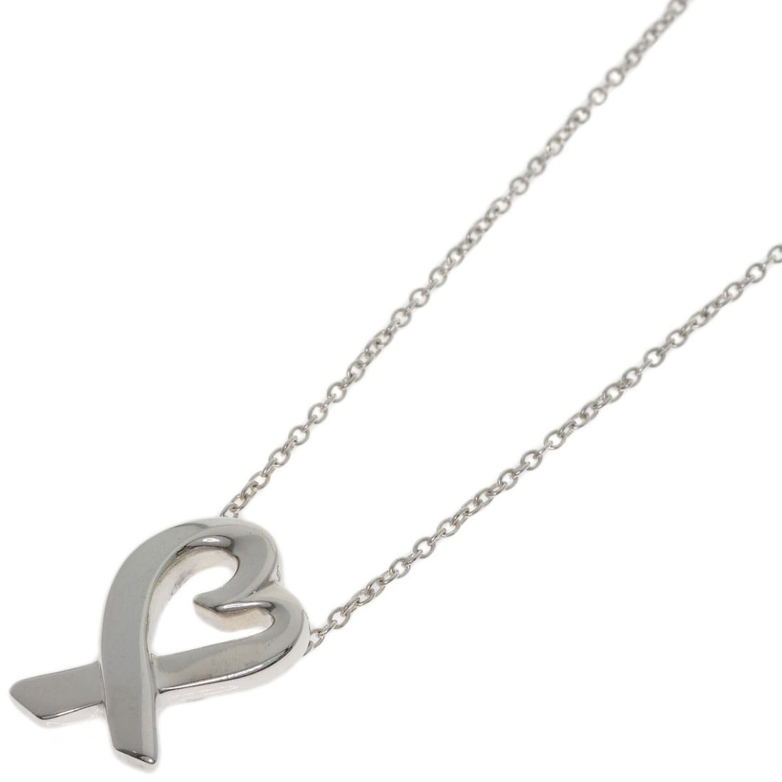 Loving Heart Necklace Tiffany&Co. Silver: Loving Heart Necklace Tiffany&Co. Silver Tiffany&Co. Silver Loving Heart Necklace is a beautiful piece of jewelry featuring a silver necklace with a 16.9inch length. The necklace bears a signature, an