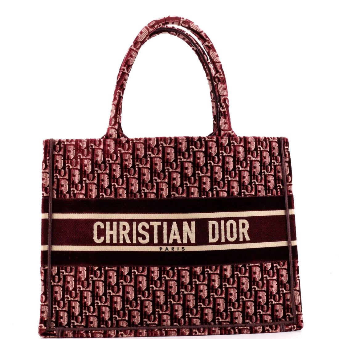 Christian Dior Book Oblique Velvet Small Tote: Christian Dior Book Oblique Velvet Small Tote The Christian Dior Book Oblique Velvet Small Tote is a striking small tote with a bold red velvet exterior and matching interior. Its distinctive oblique 