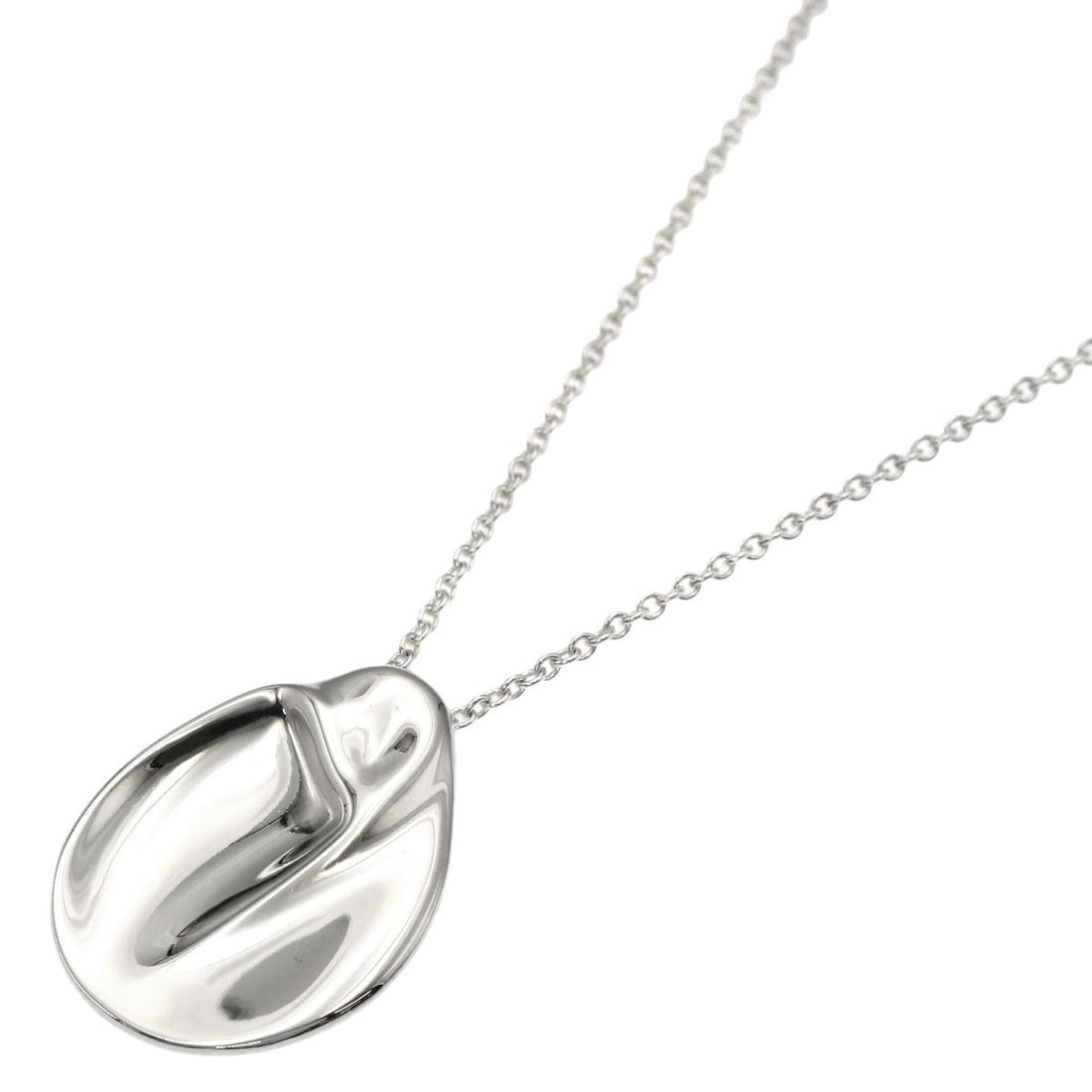 Madonna Silver Necklace Tiffany&Co: Madonna Silver Necklace Tiffany&Co Silver necklace from Tiffany&Co. features a stylish 16.5-inch length. The necklace is made of silver metal and does not include a main stone. This silver necklace