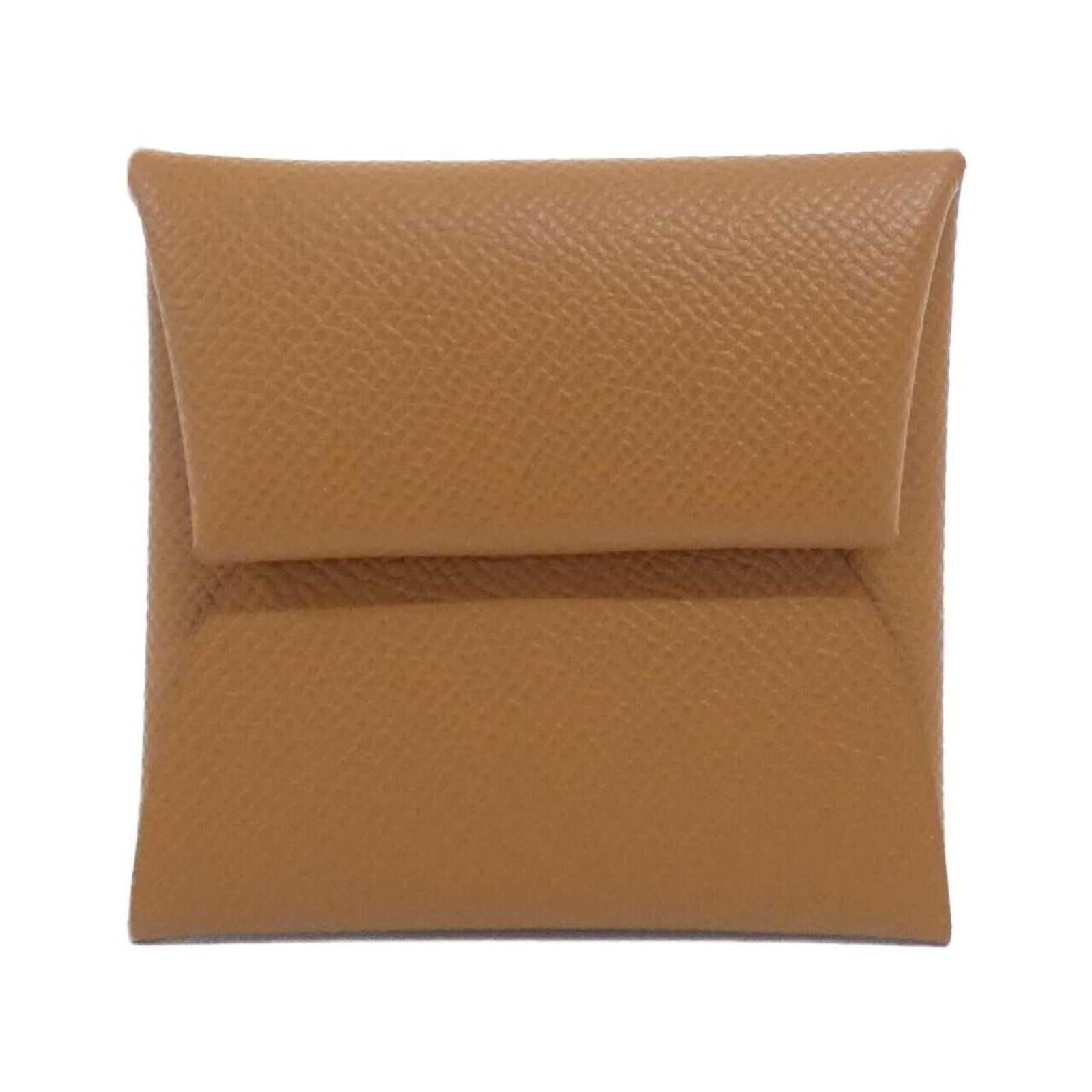 Hermes Coin Purse/ Coin Case Epsom Leather: Hermes Coin Purse/ Coin Case Epsom Leather Epsom leather craftsmanship shines in this classic Hermes coin purse, with its rich brown color and gold accents. Made from high-quality Epsom leather, this