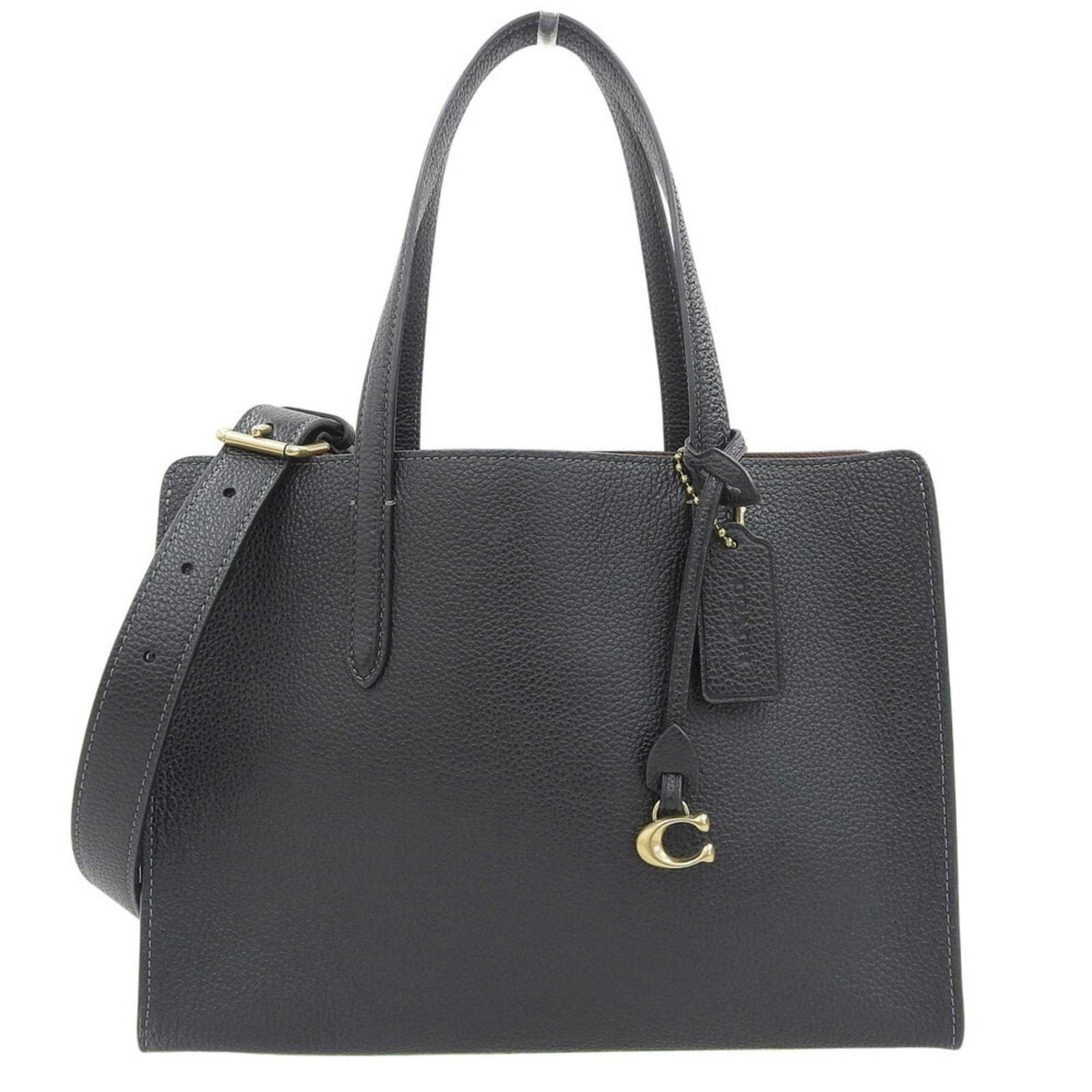 Coach Tote Bag Leather: Coach Tote Bag Leather The Coach Country tote bag is crafted from high-quality leather, offering a sleek and sophisticated design. Measuring 21cm x 28cm x 10cm, this bag features a classic black