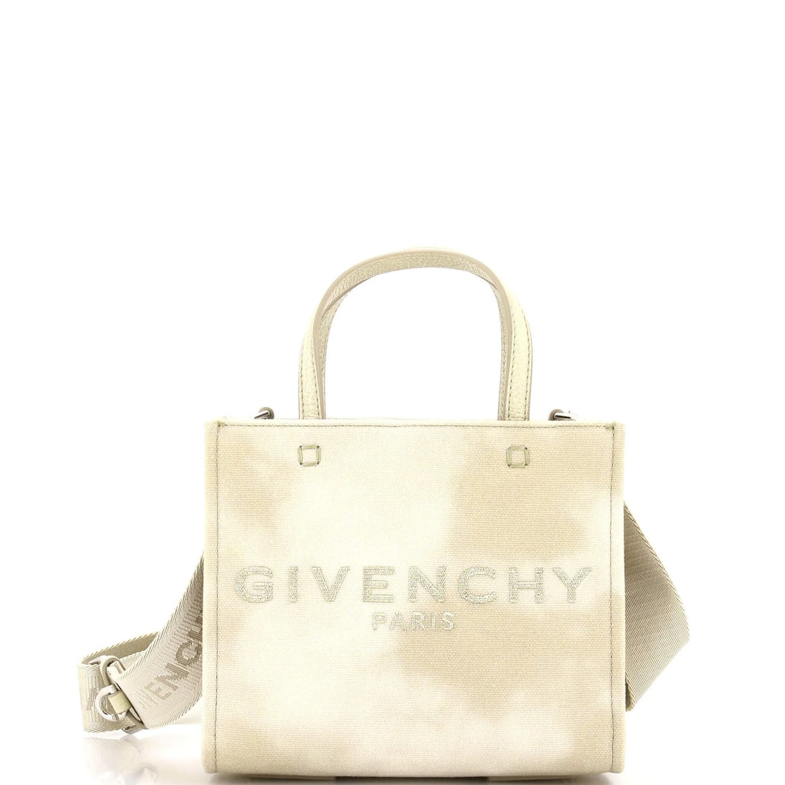 Givenchy Mini Canvas Tote: Givenchy Mini Canvas Tote The Givenchy Mini Canvas Tote is a compact and stylish accessory, measuring 6.5" in height, 7" in width, and 3.5" in depth. Its neutral exterior color and canvas material