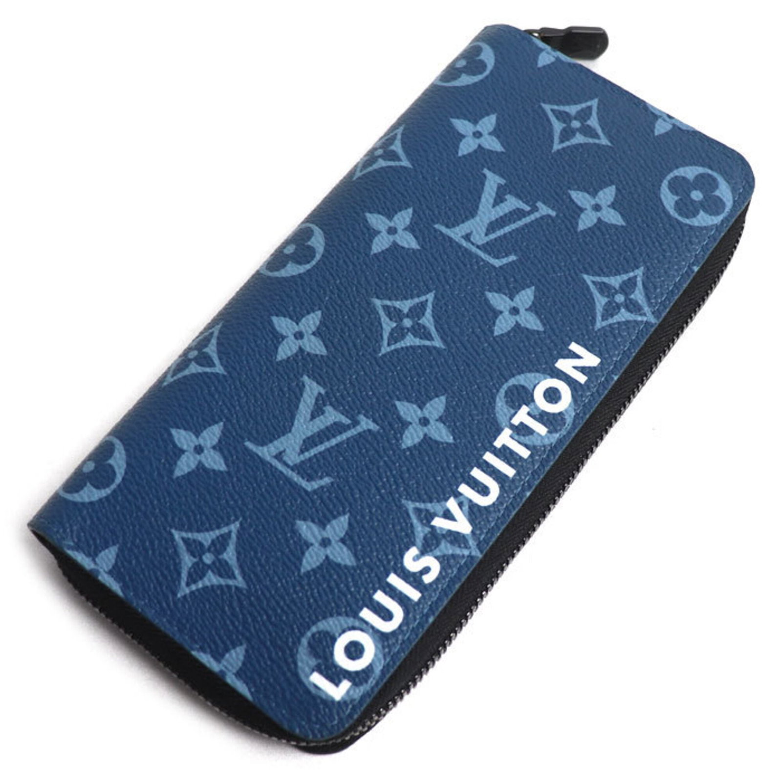 Louis Vuitton Long Wallet (Bi-Fold) Monogram: Louis Vuitton Long Wallet (Bi-Fold) Monogram Monogrammed with iconic blue accents, this Louis Vuitton bi-fold wallet boasts a timeless design that exudes luxury and sophistication. Crafted with