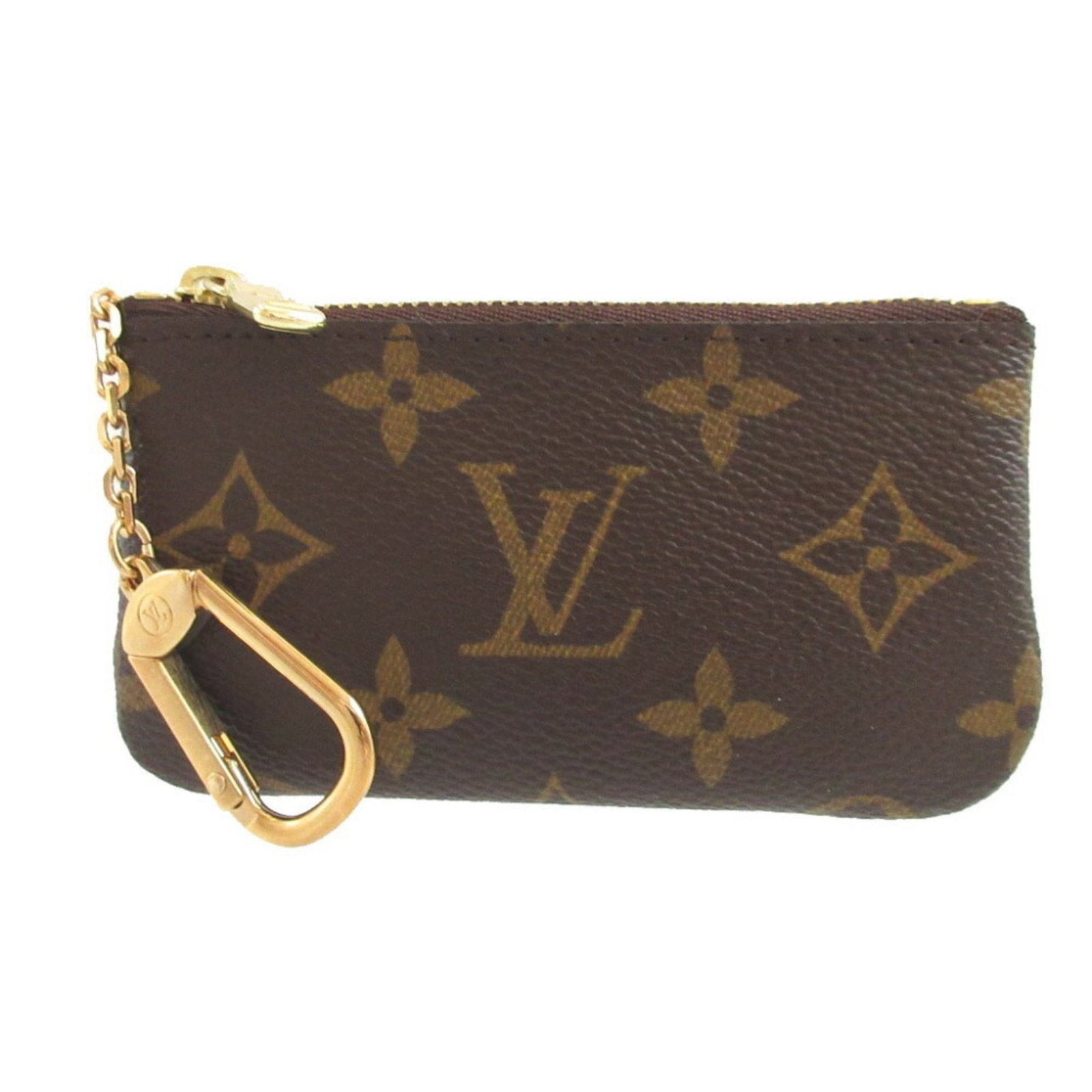Coin purse Monogram Louis Vuitton: Coin purse Monogram Louis Vuitton This Louis Vuitton coin purse features the iconic monogram pattern in brown. The item comes with a box and dust bag for added convenience. A stylish accessory for