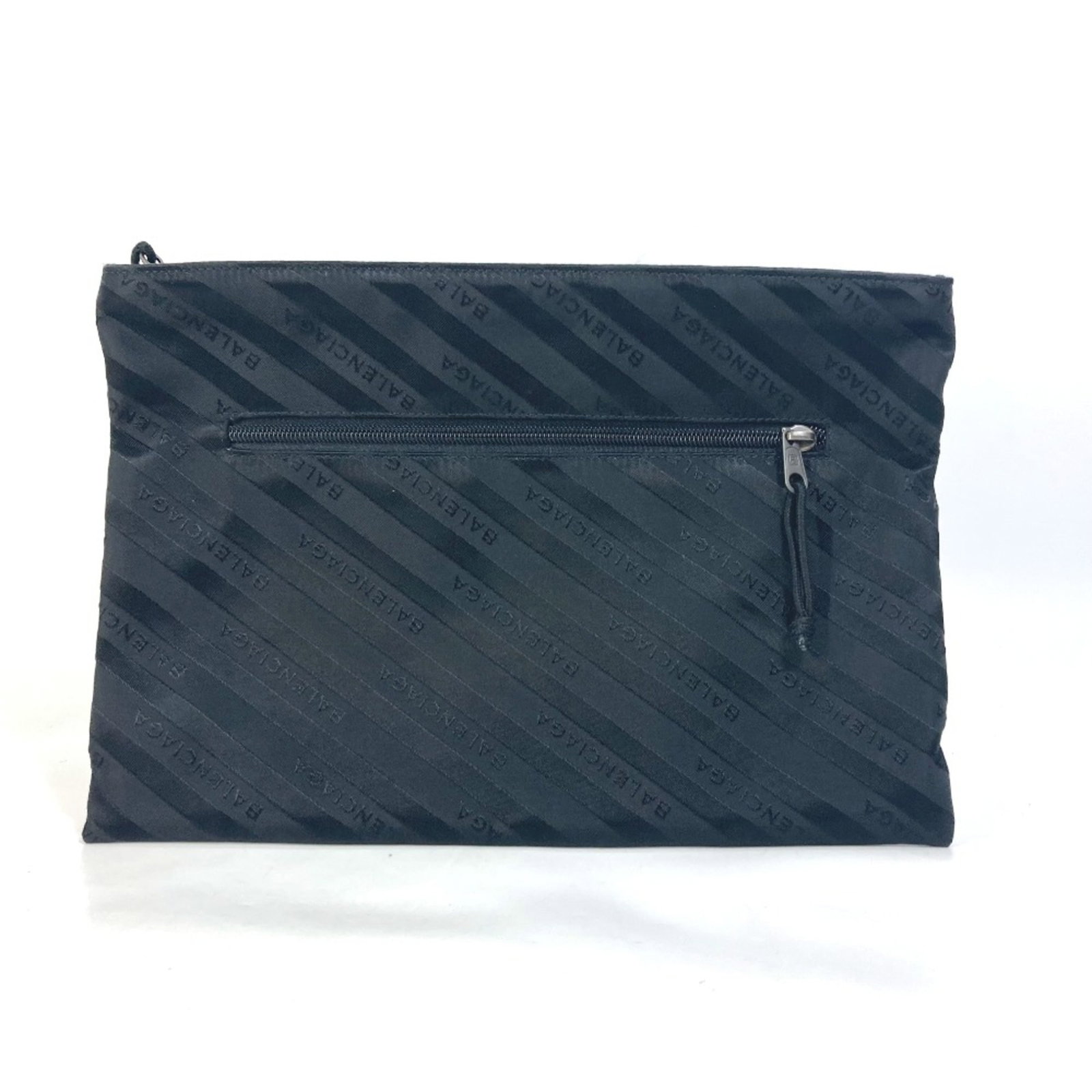 Bag Cloth Clutch Balenciaga: Bag Cloth Clutch Balenciaga Balenciaga's 459745 clutch bag features a sleek black cloth design with a compact size of 31.5cm x 22cm and 12.4cm x 8.7cm. The bag's rectangular shape and simple