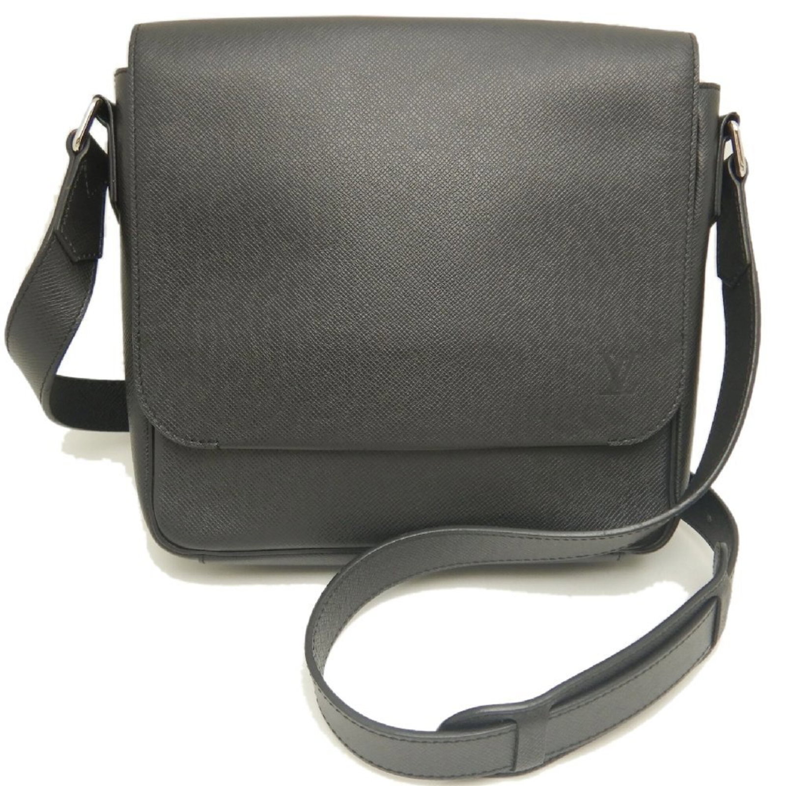 Shoulder Bag Taiga Leather Louis Vuitton: Shoulder Bag Taiga Leather Louis Vuitton Taiga leather shoulder bag from Louis Vuitton, featuring a classic design with clean lines and a timeless Noir color. Made from high-quality Taiga leather, thi