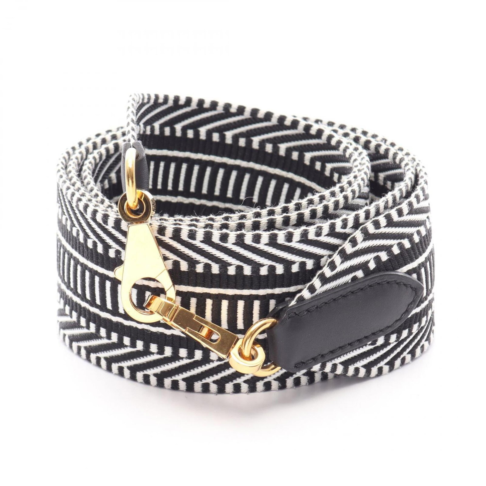 Women Swift Leather Black White Veau Toile Bandoulire Sangle Caval Accessory Shoulder Strap Hermes: Women Swift Leather Black White Veau Toile Bandoulire Sangle Caval Accessory Shoulder Strap Hermes Swift leather bandoulire sangle from Hermes, featuring a striking black and white toile design. This