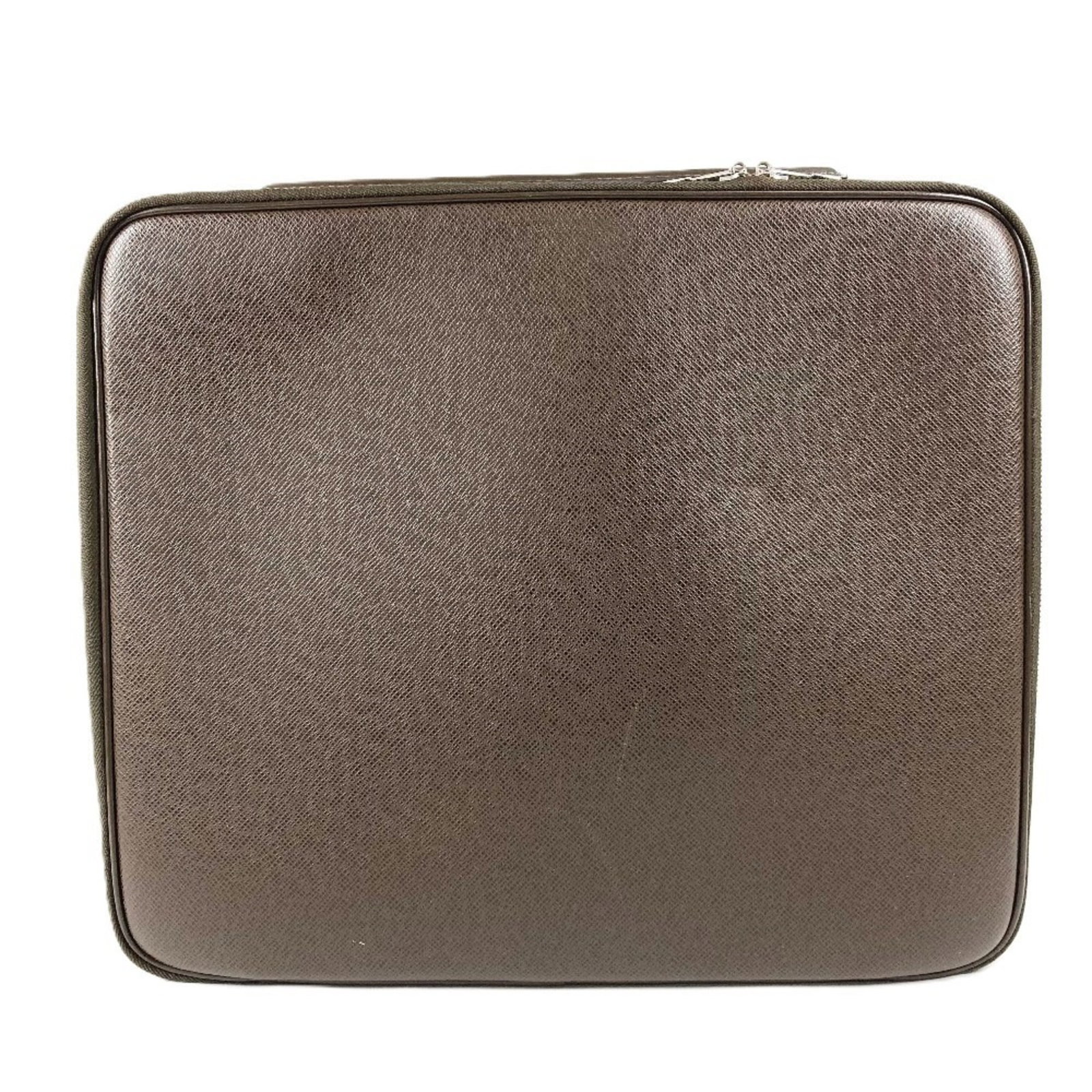 Handbag Tote Bag Leather Taiga Louis Vuitton: Handbag Tote Bag Leather Taiga Louis Vuitton Taiga leather gives this Louis Vuitton tote bag its distinctive brown, grizzly hue. Made from high-quality Taiga leather, the bag measures 31cm x 37cm x