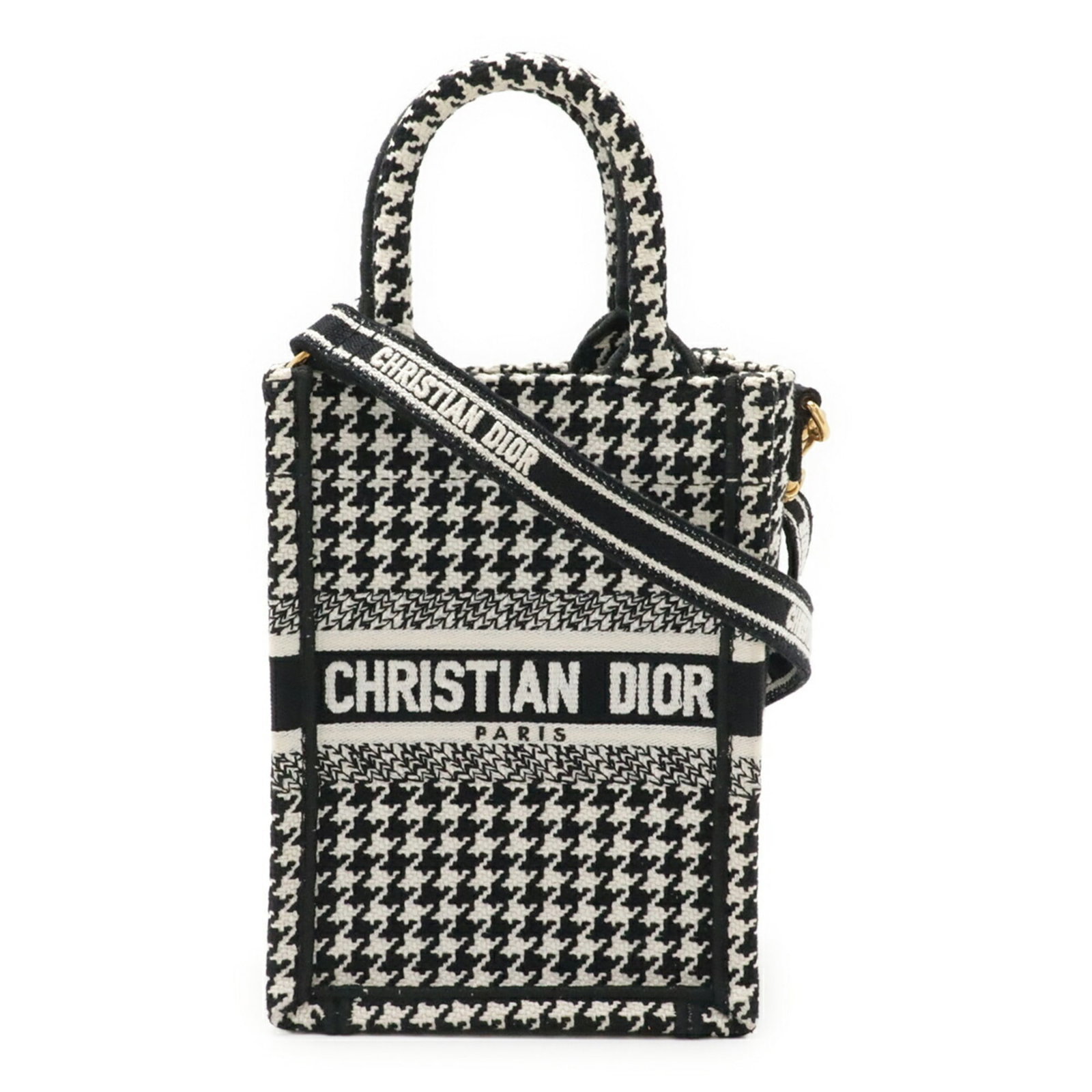 Shoulder Bag Dior Christian: Shoulder Bag Dior Christian The Dior Christian shoulder bag features a sleek, canvas design in black and white, measuring 18cm x 13cm x 7cm. A notable detail of this bag is its compact size, making