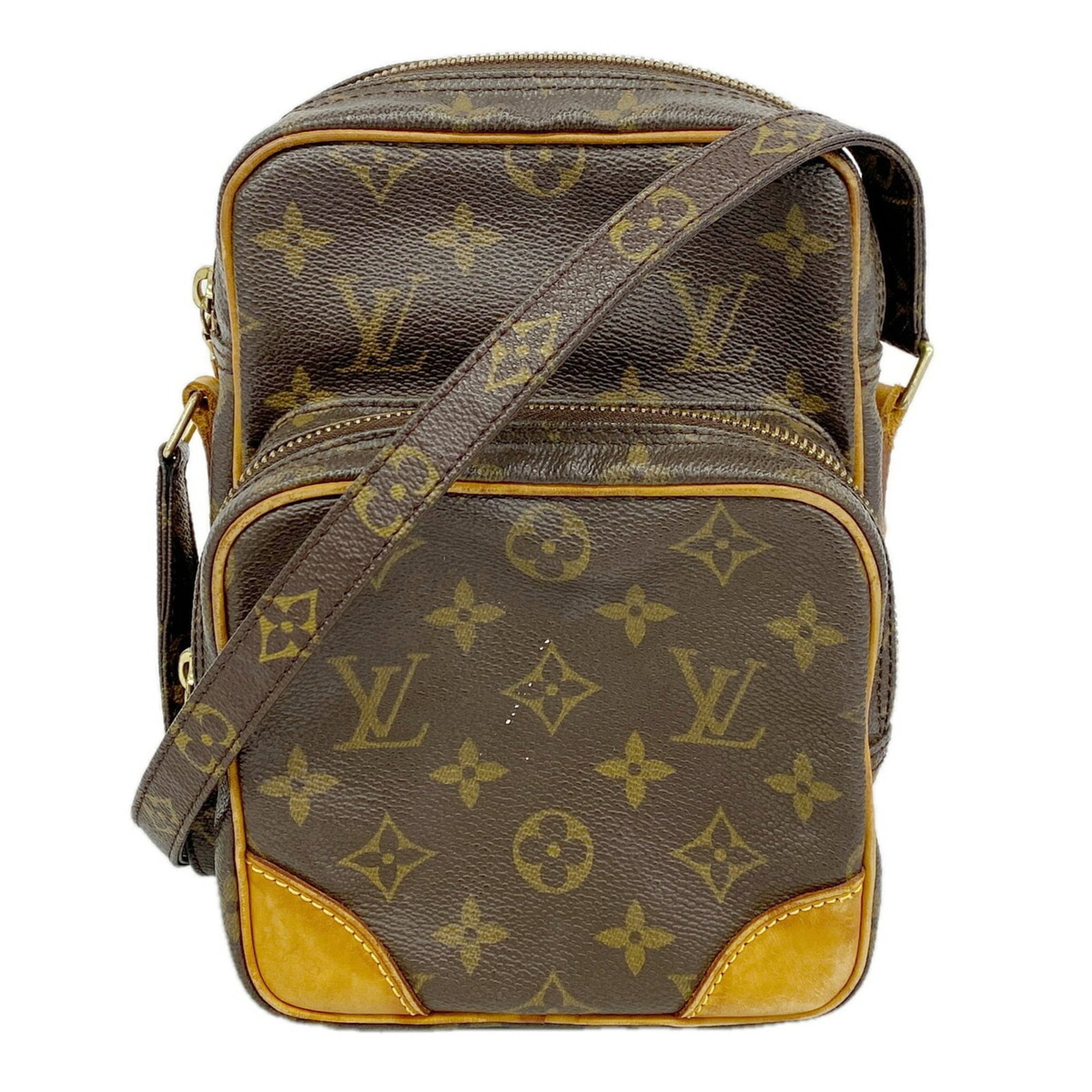 Shoulder Bag by Louis Vuitton: Shoulder Bag by Louis Vuitton Brown Louis Vuitton shoulder bag with dimensions 21cm x 15cm x 9cm. This stylish bag features a classic design with a signature LV monogram pattern. Made from