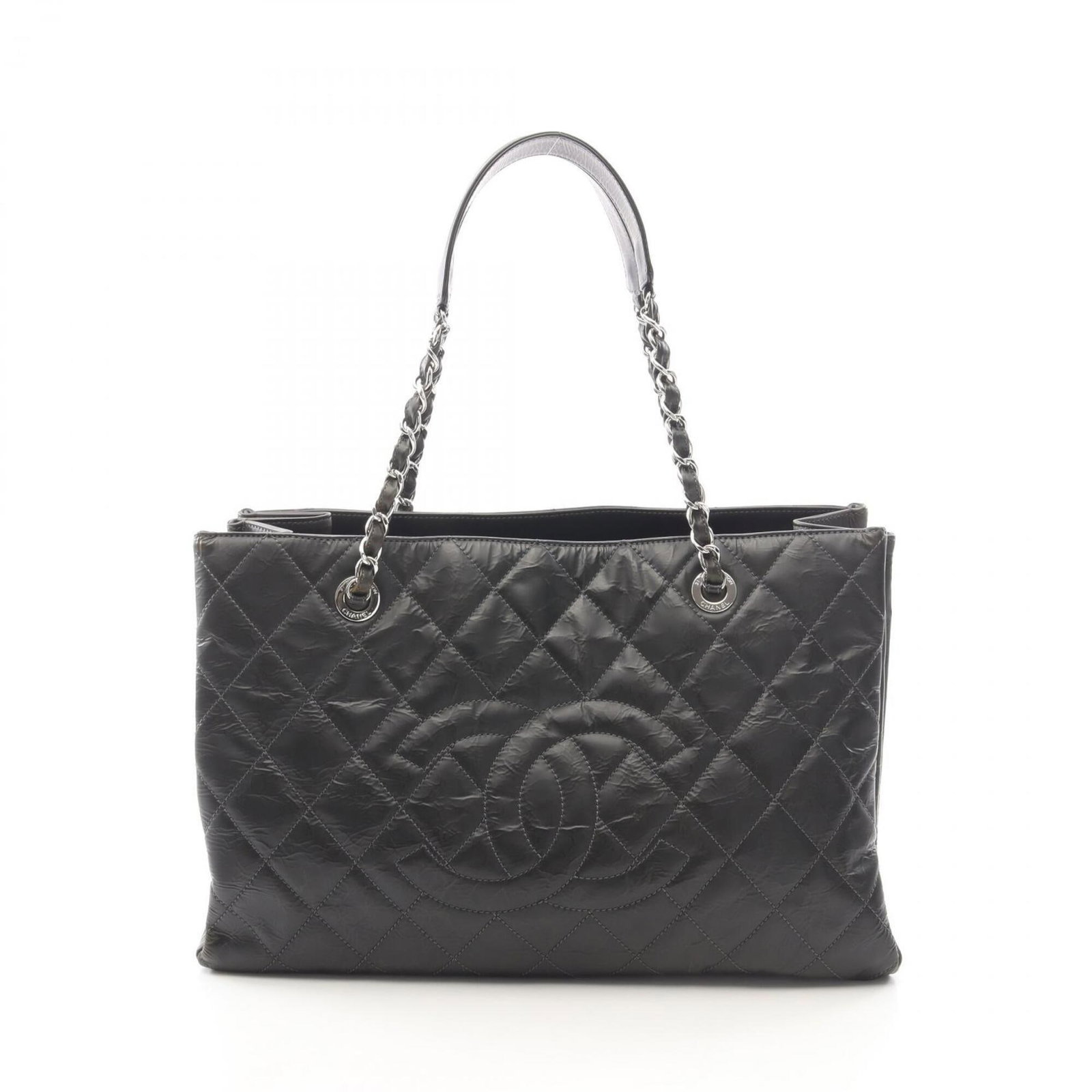 Chanel Handbag Leather Tote: Chanel Handbag Leather Tote This sleek black leather tote bag from Chanel boasts a sophisticated design with silver hardware, making it a stylish accessory for any occasion. Measuring 24cm x 39cm x